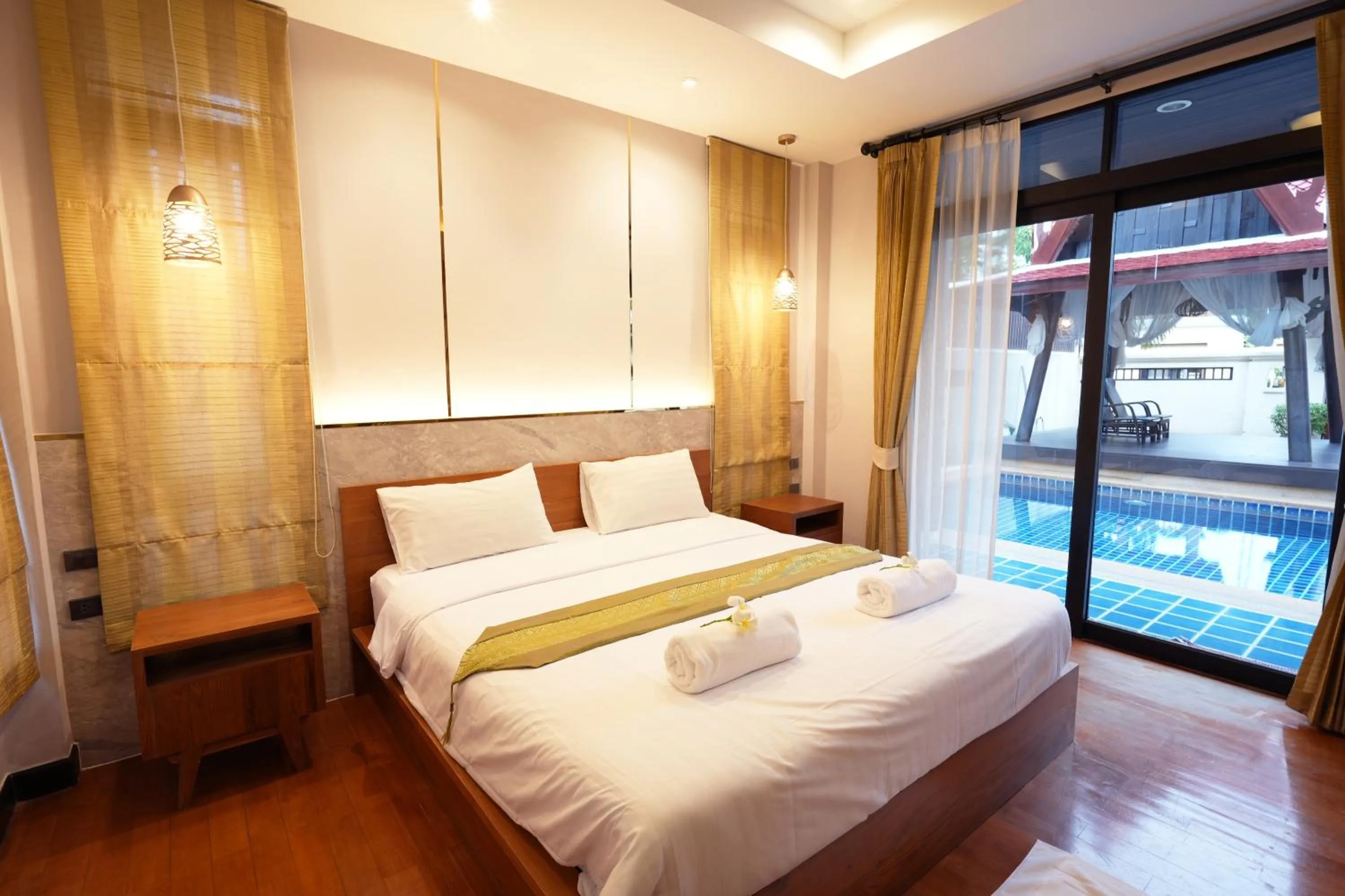 Bedroom, Bed in รมิดา พูล วิลล่า พัทยา Ramida Pool Villa Pattaya
