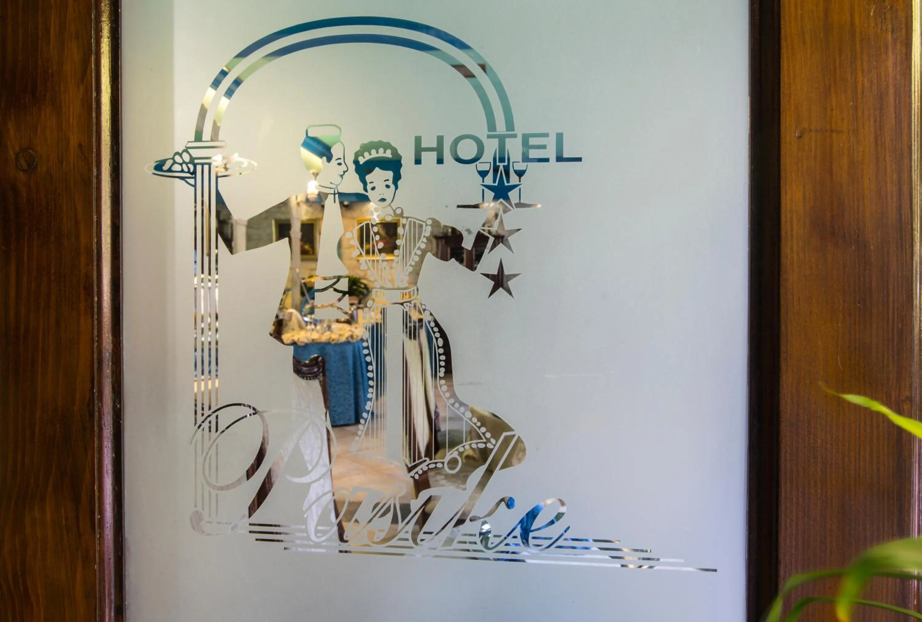 Property logo or sign in Heritage Hotel Pasike