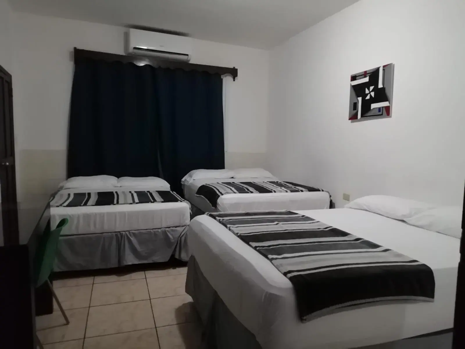 Basic Triple Room with Shared Bathroom in Apart Hotel Express Basic Triple Room with Shared Bathroom in Apart Hotel Express