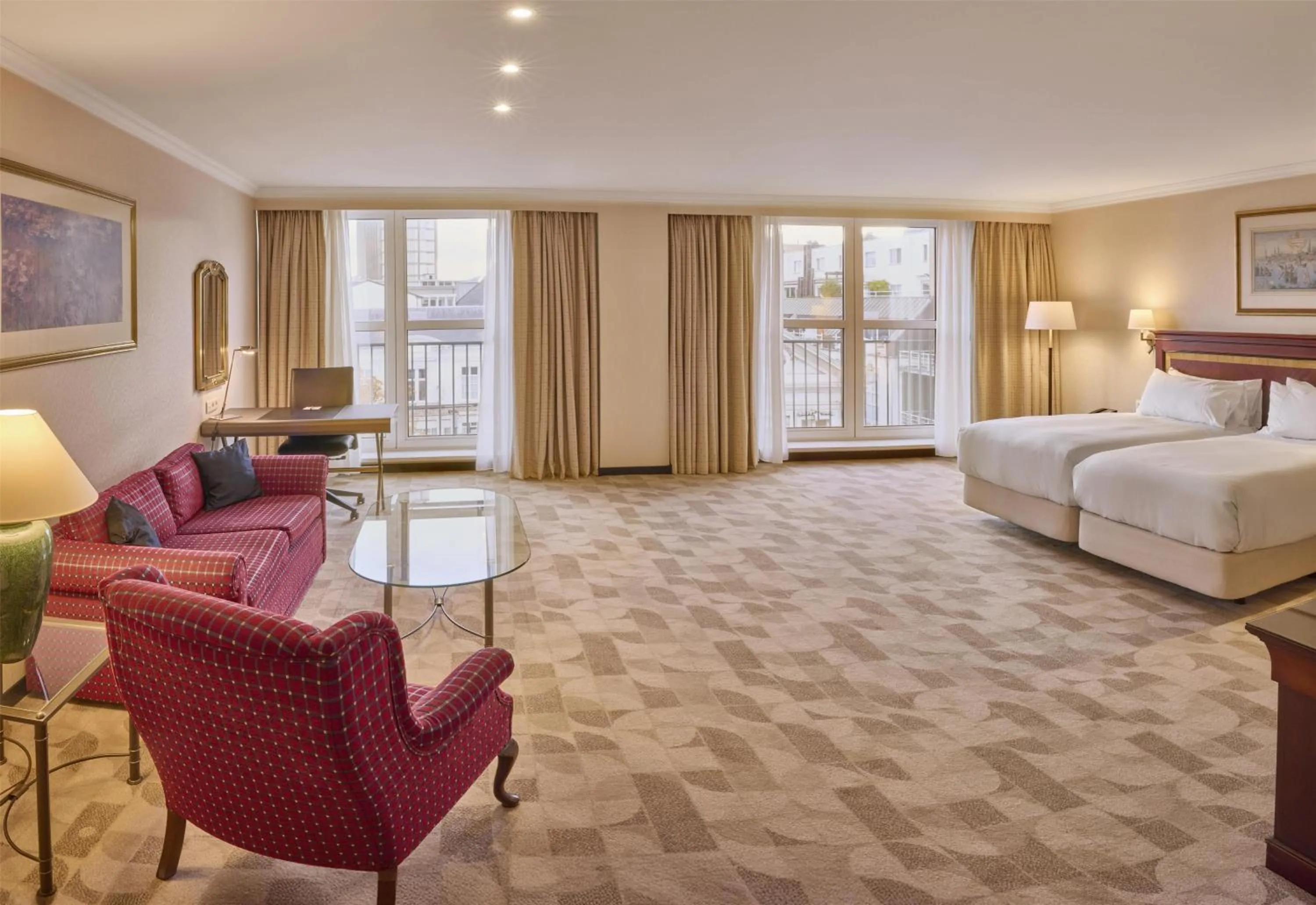 Living room, Bed in Hilton Antwerp Old Town