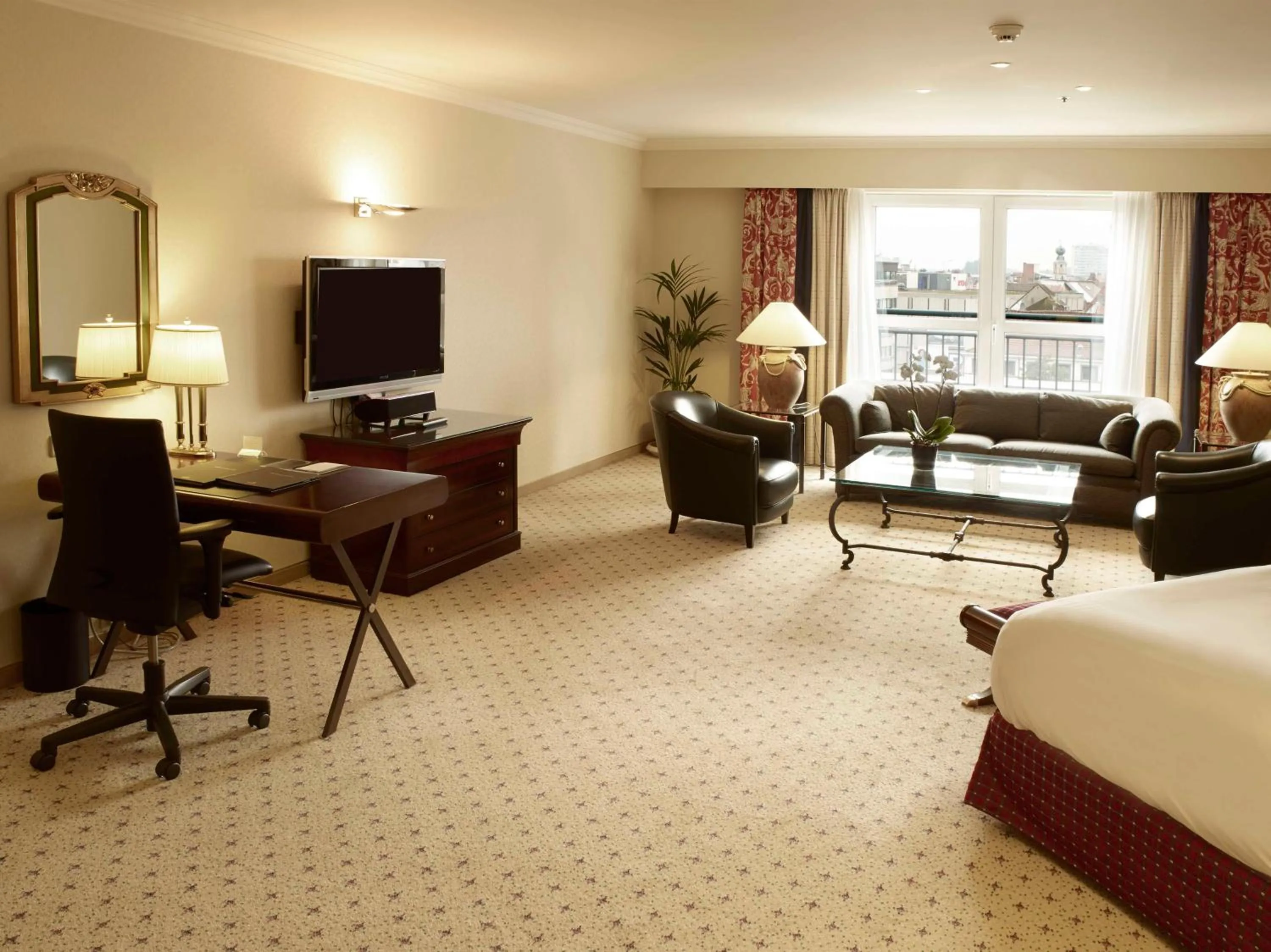 Living room, Bed in Hilton Antwerp Old Town