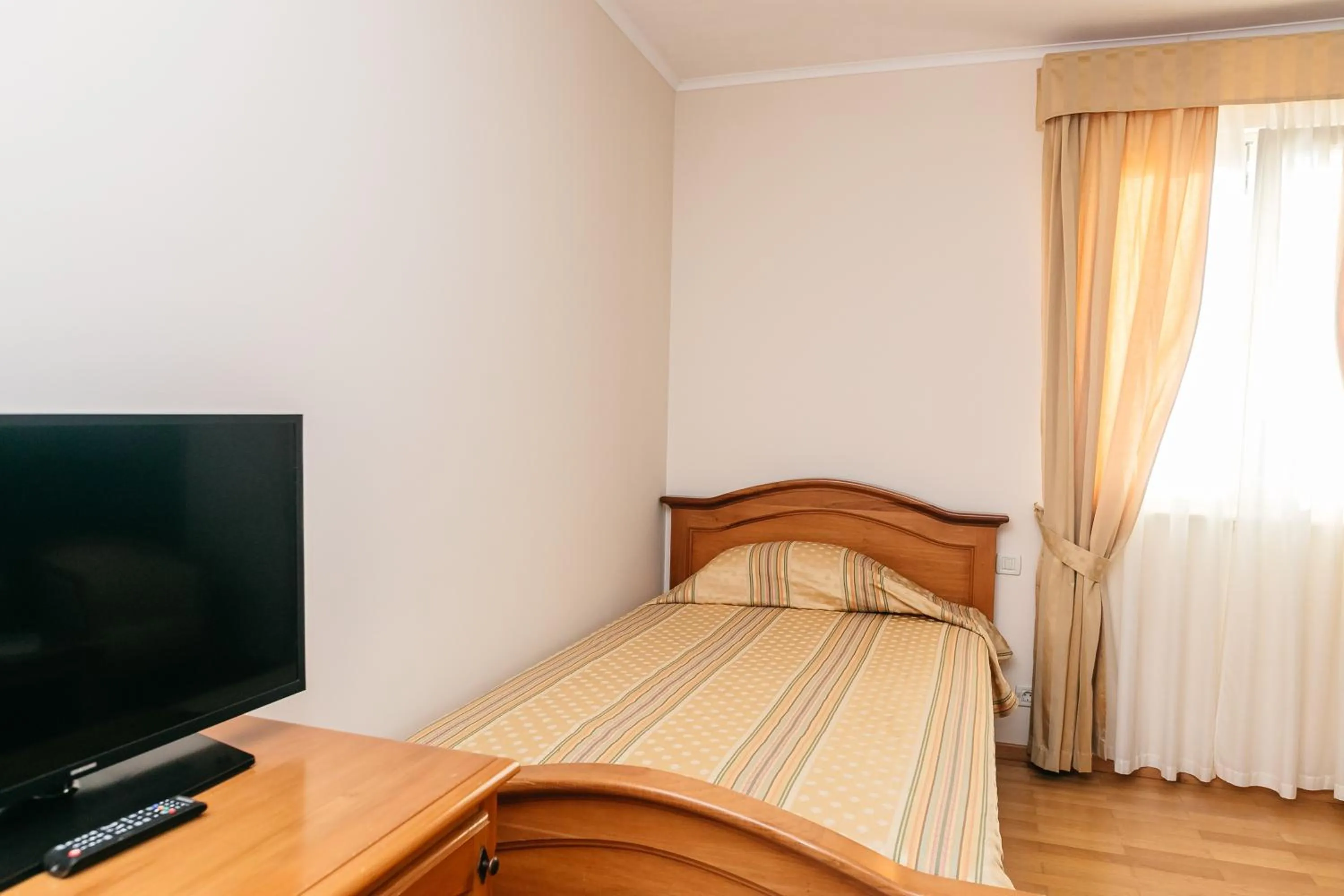 Bed in Hotel Spongiola