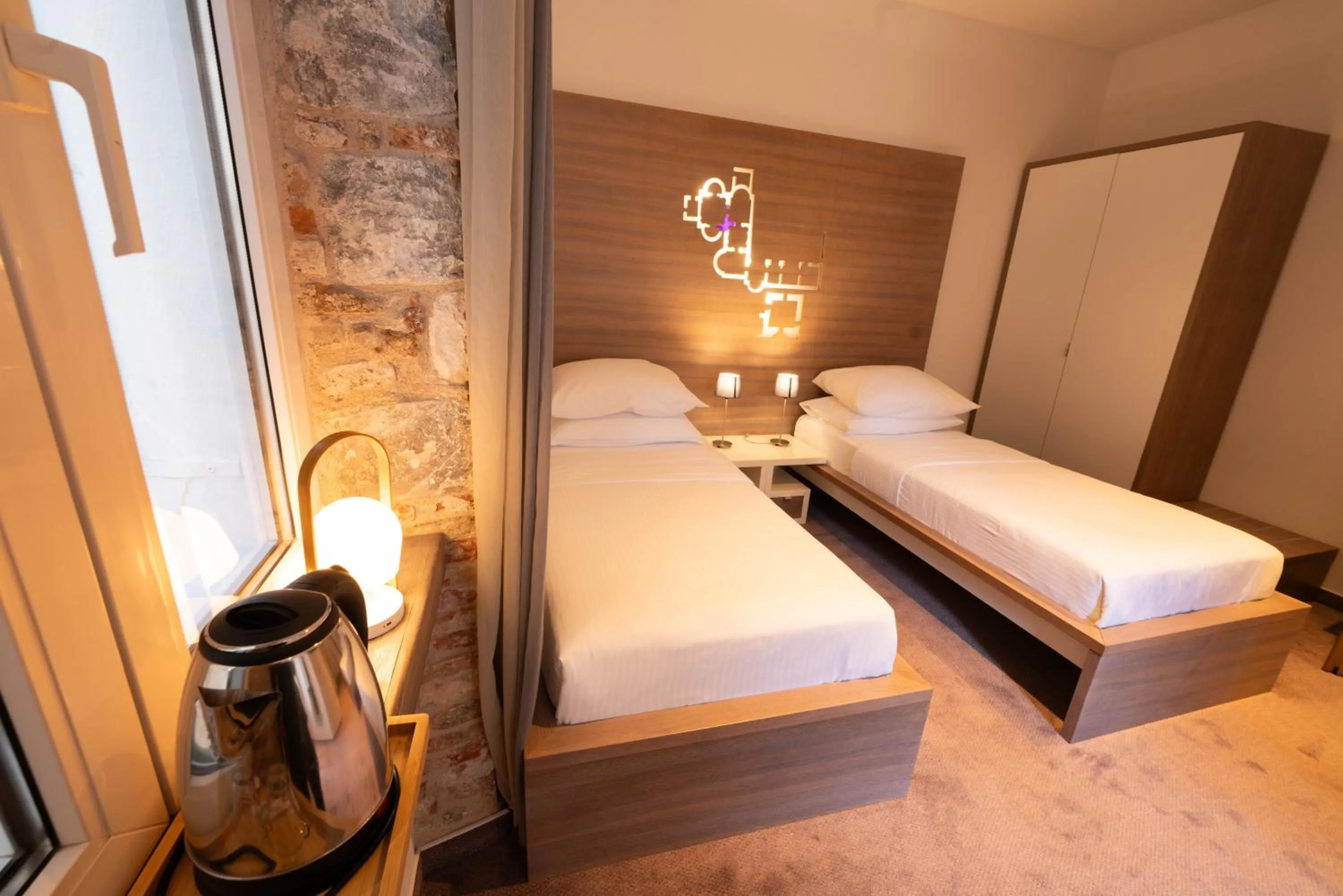 Bed in Slavija Culture Heritage Hotel