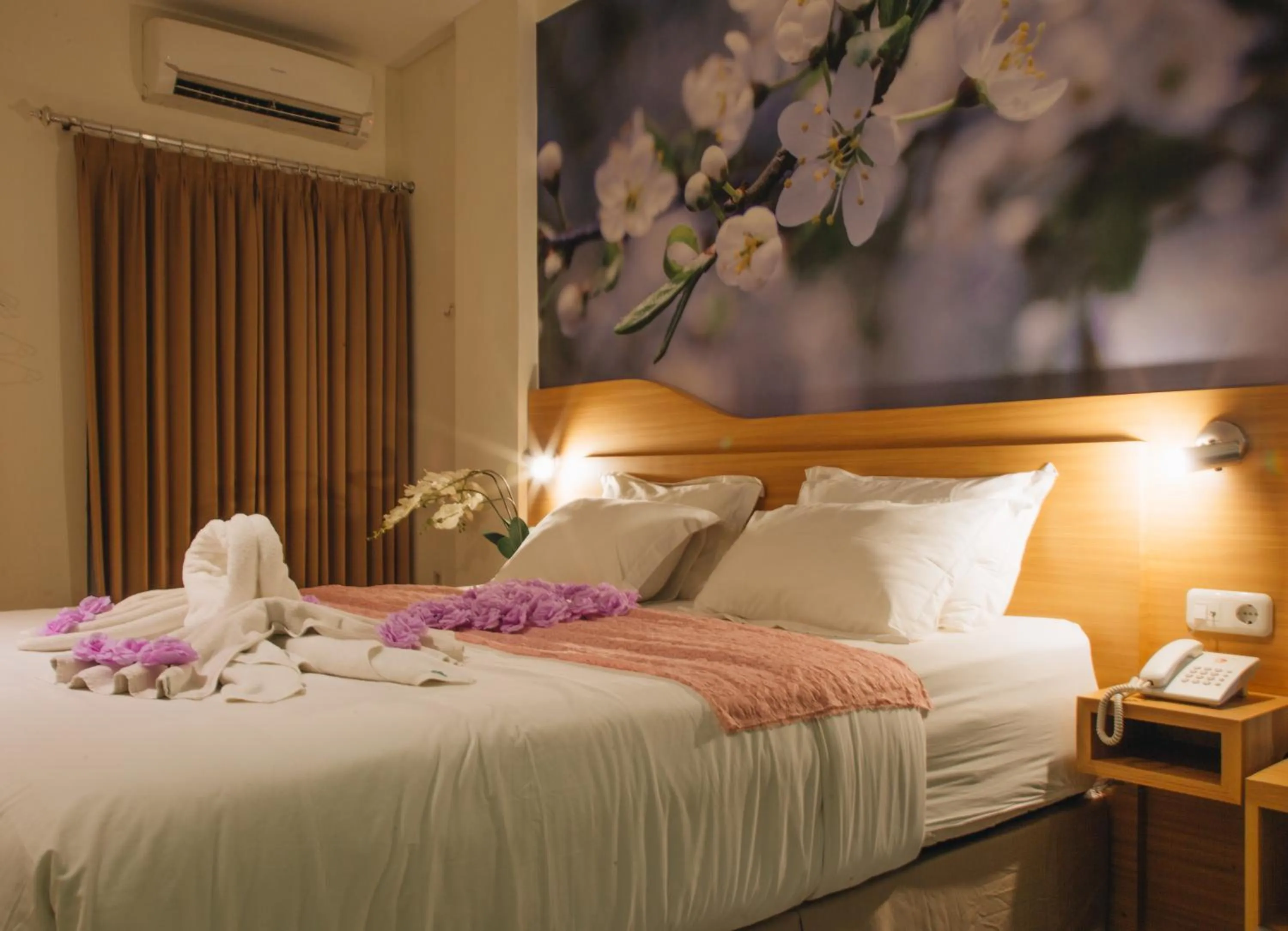 Bed in Deva Bali Apartement