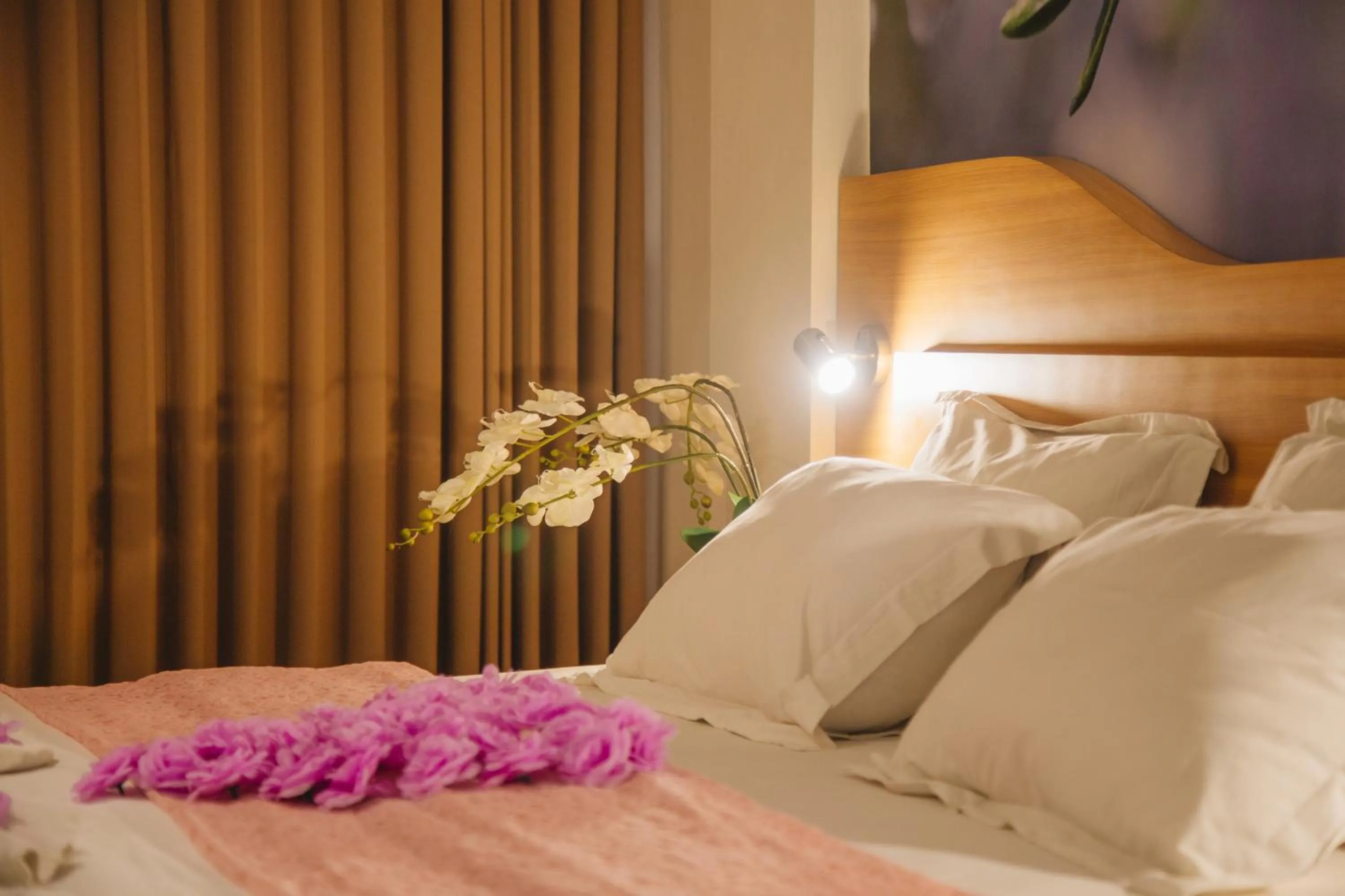 Bed in Deva Bali Apartement