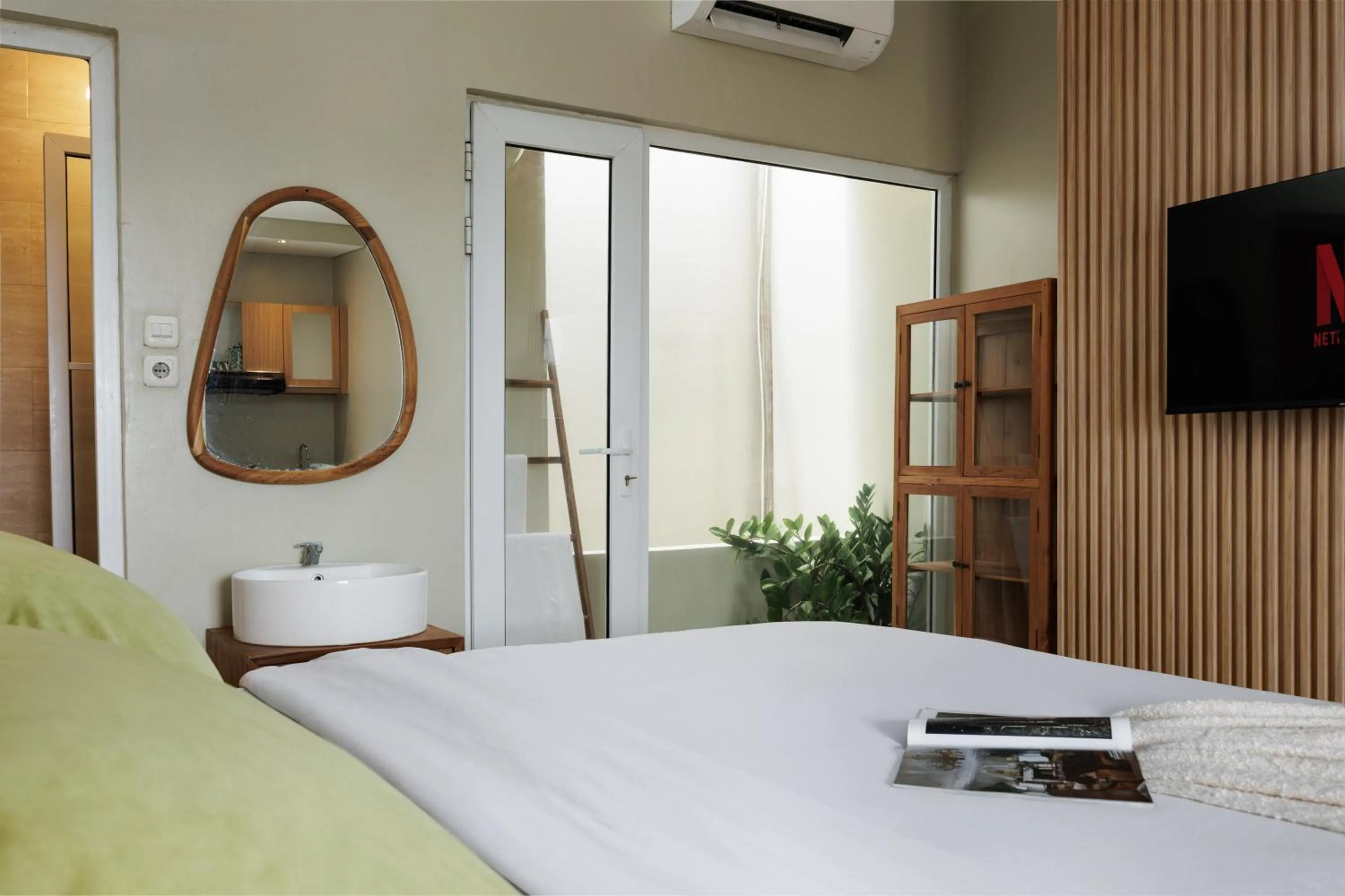 Bed in Deva Bali Apartement