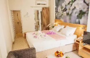 Bed in Deva Bali Apartement