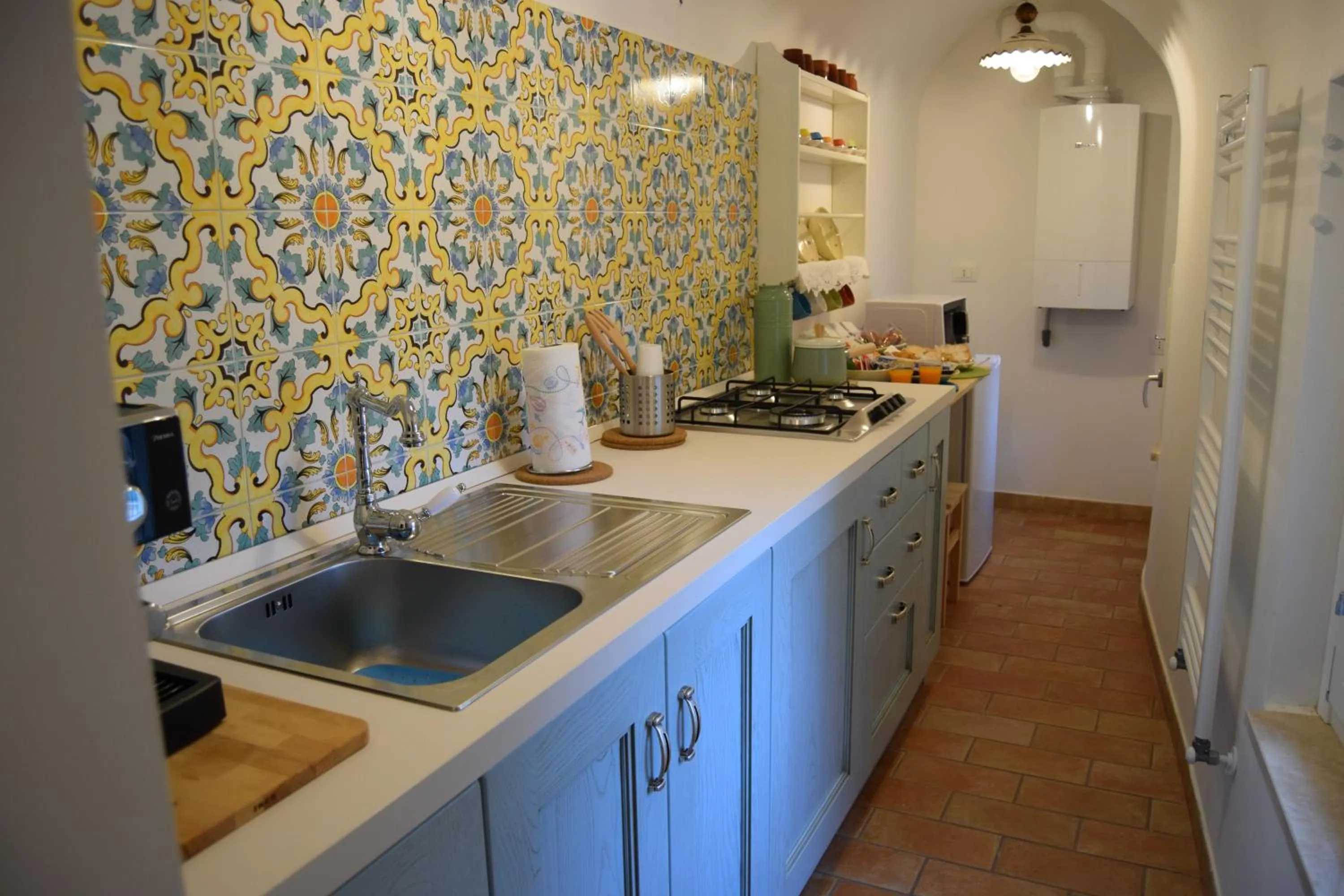Kitchen or kitchenette in Roseus La Casa Vacanze nei Sassi