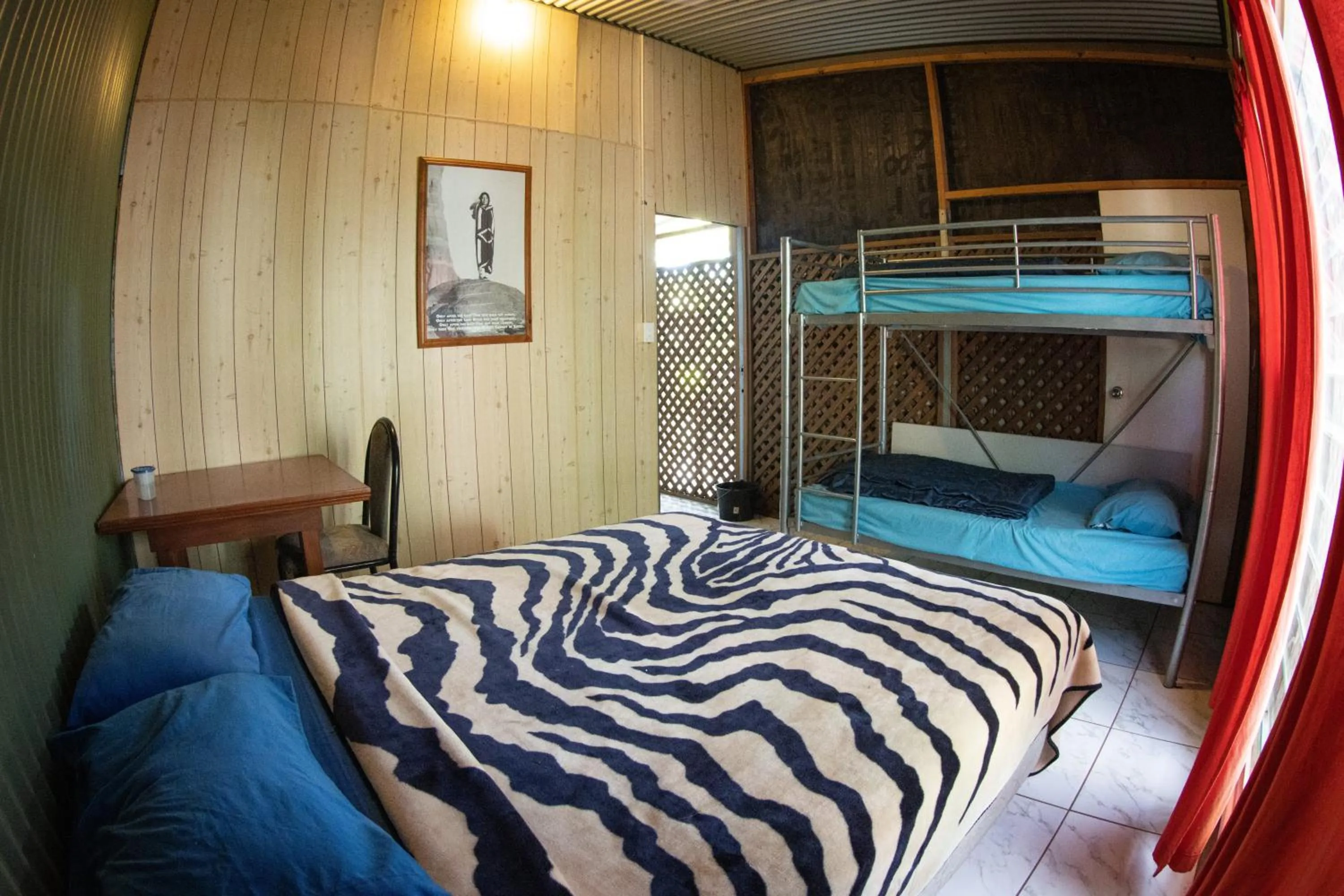 Photo of the whole room, Bed in Batchelor Butterfly Farm