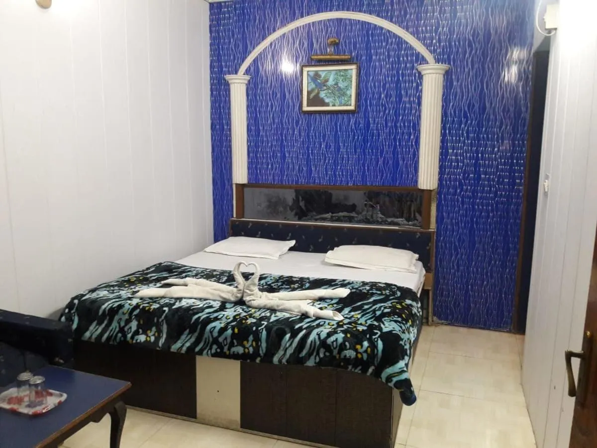 Photo of the whole room, Bed in Hotel Shehnaz Inn - Walking Distance for Golden Temple