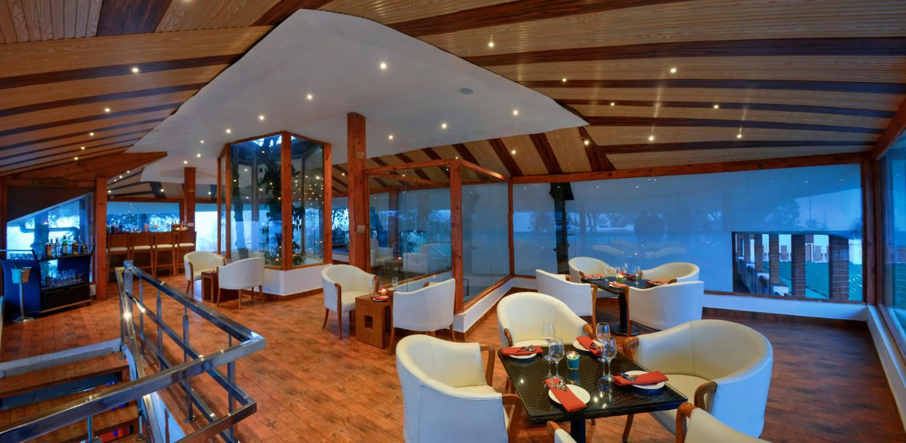 Seating area in TreeHouse Chail Villas