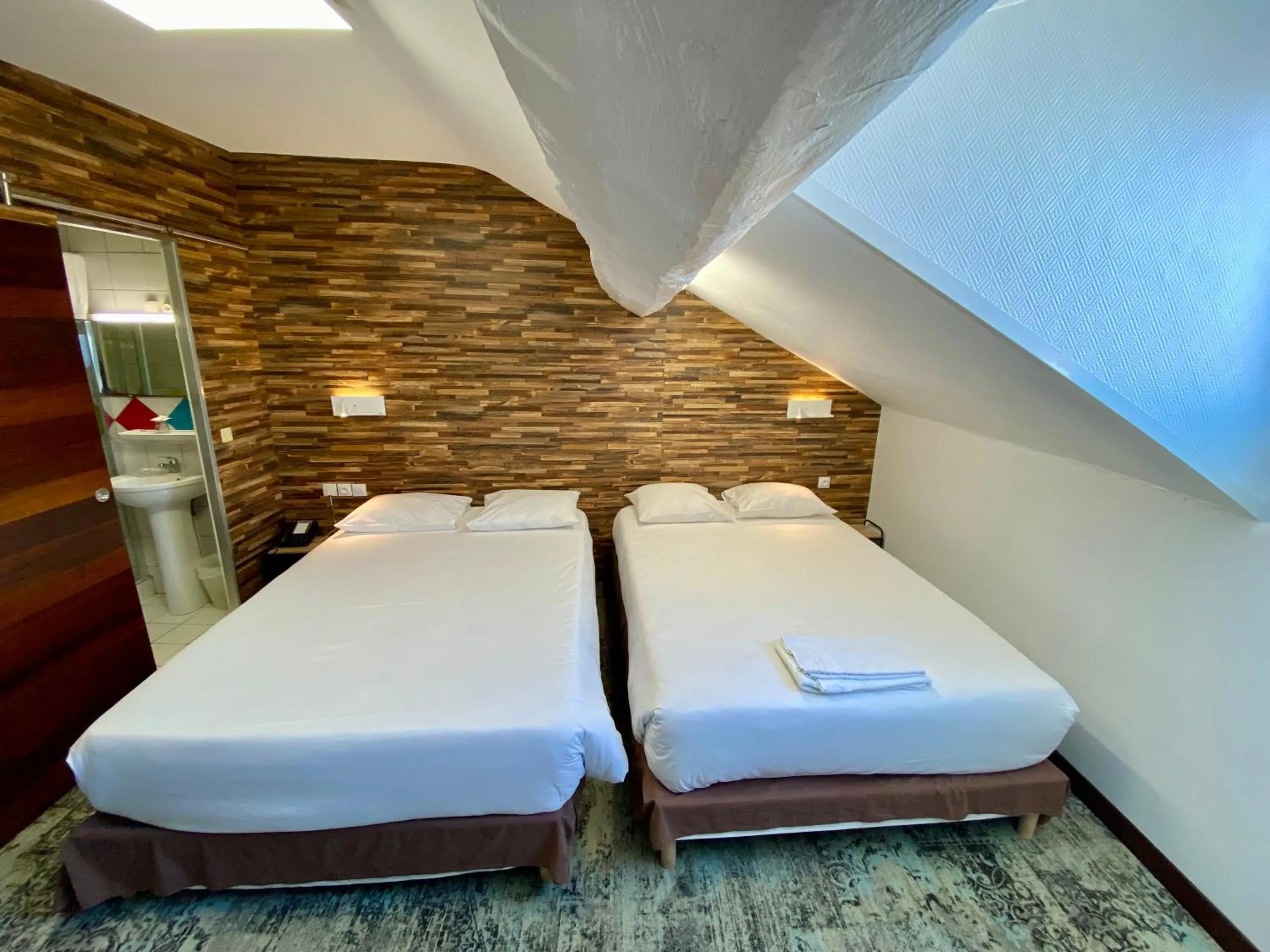 Bed in Hôtel du Helder