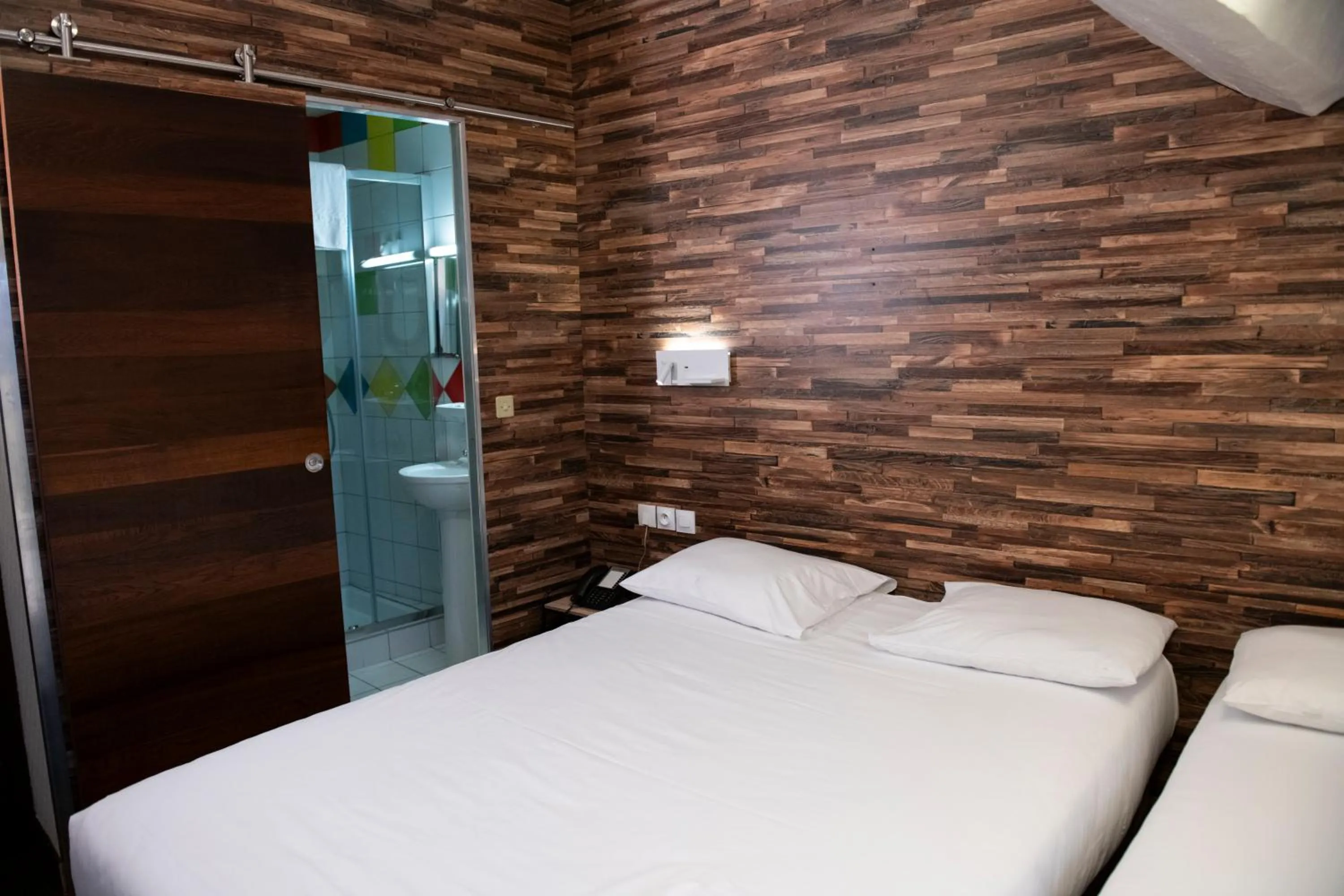 Bed in Hôtel du Helder