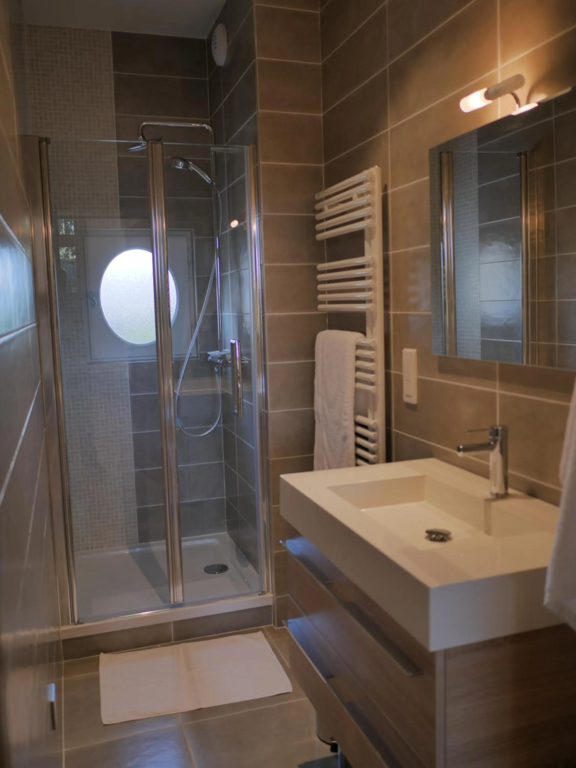 Bathroom in Résidence de Tourisme Central Parc Tours