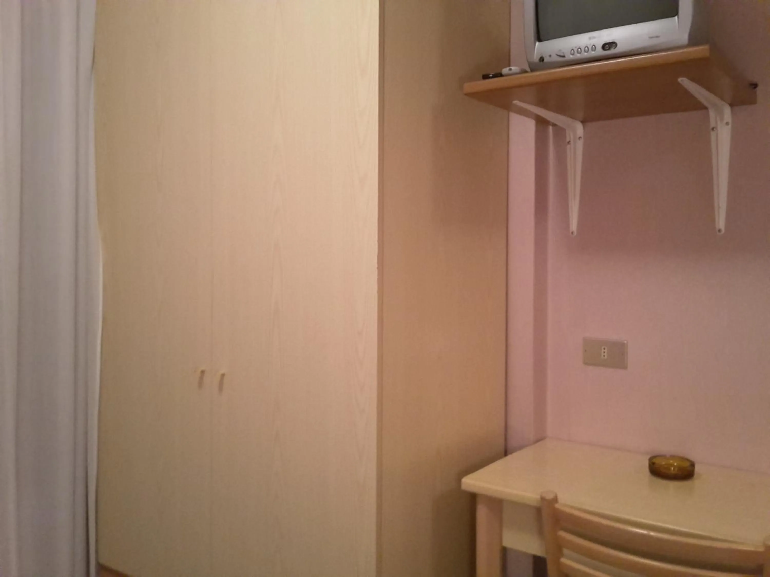 Bedroom in Hotel Mignon