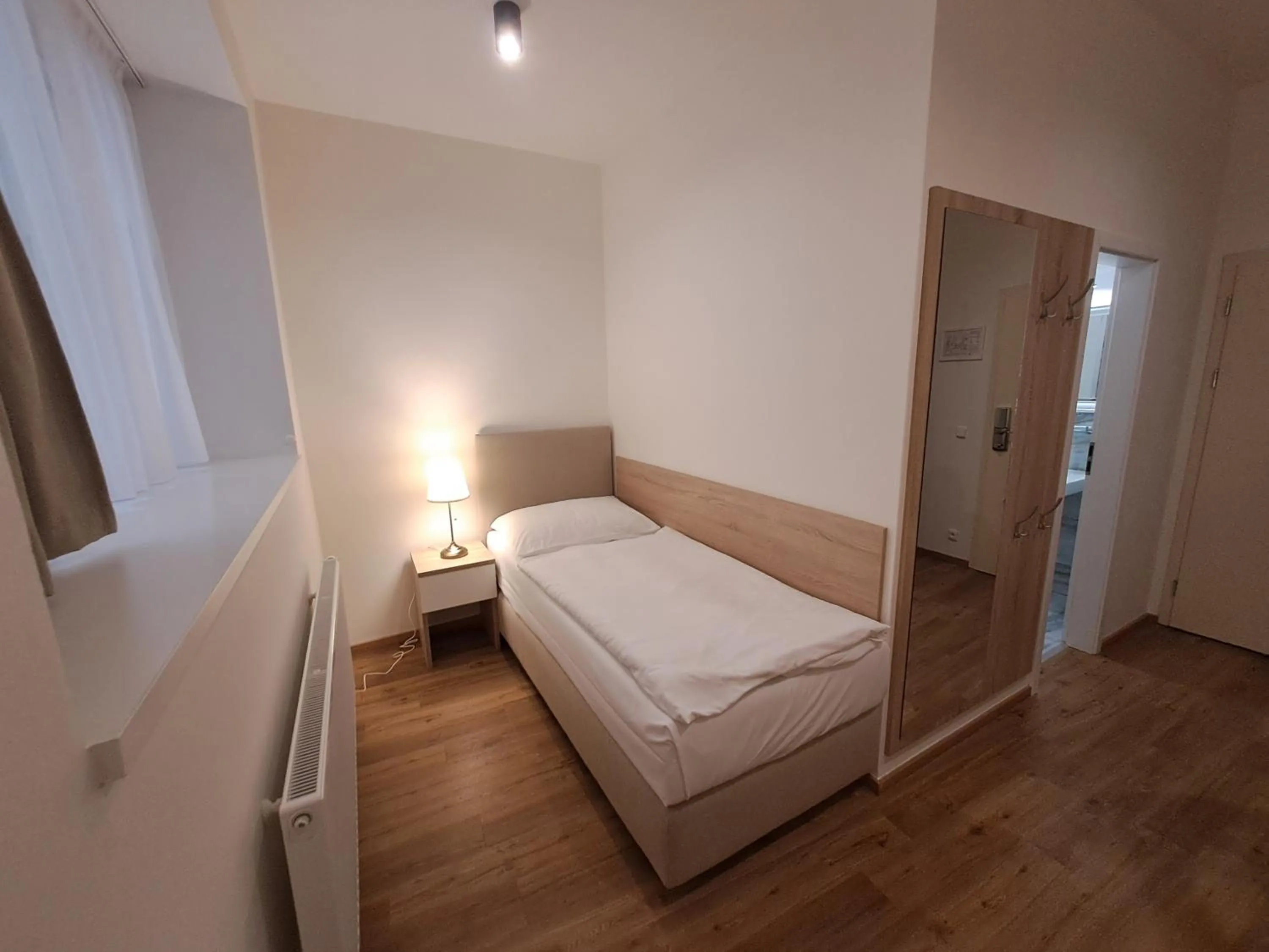 Bed in Hotel Garden Court