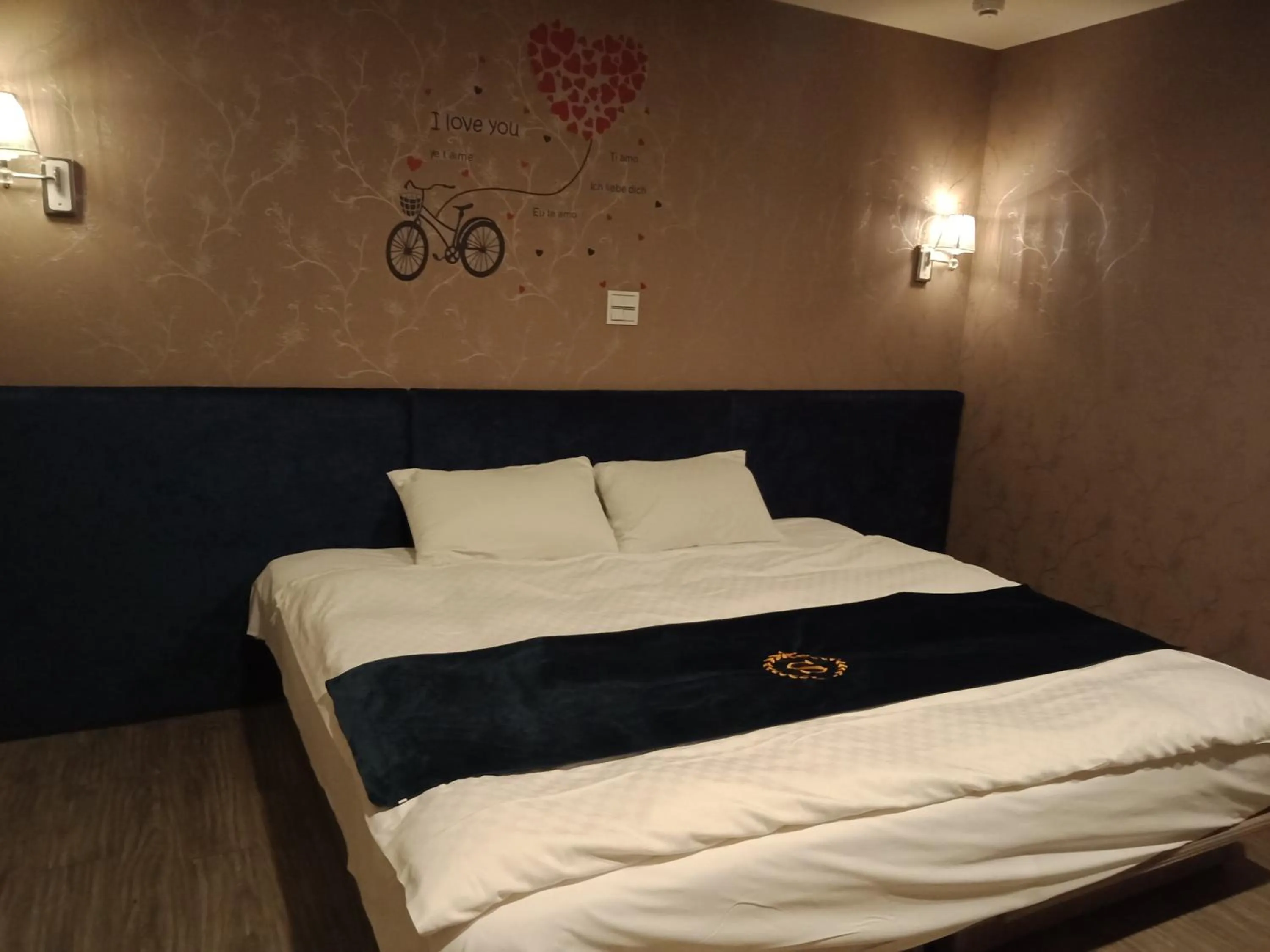 Bedroom in 慶城商旅Urbanone Hotel