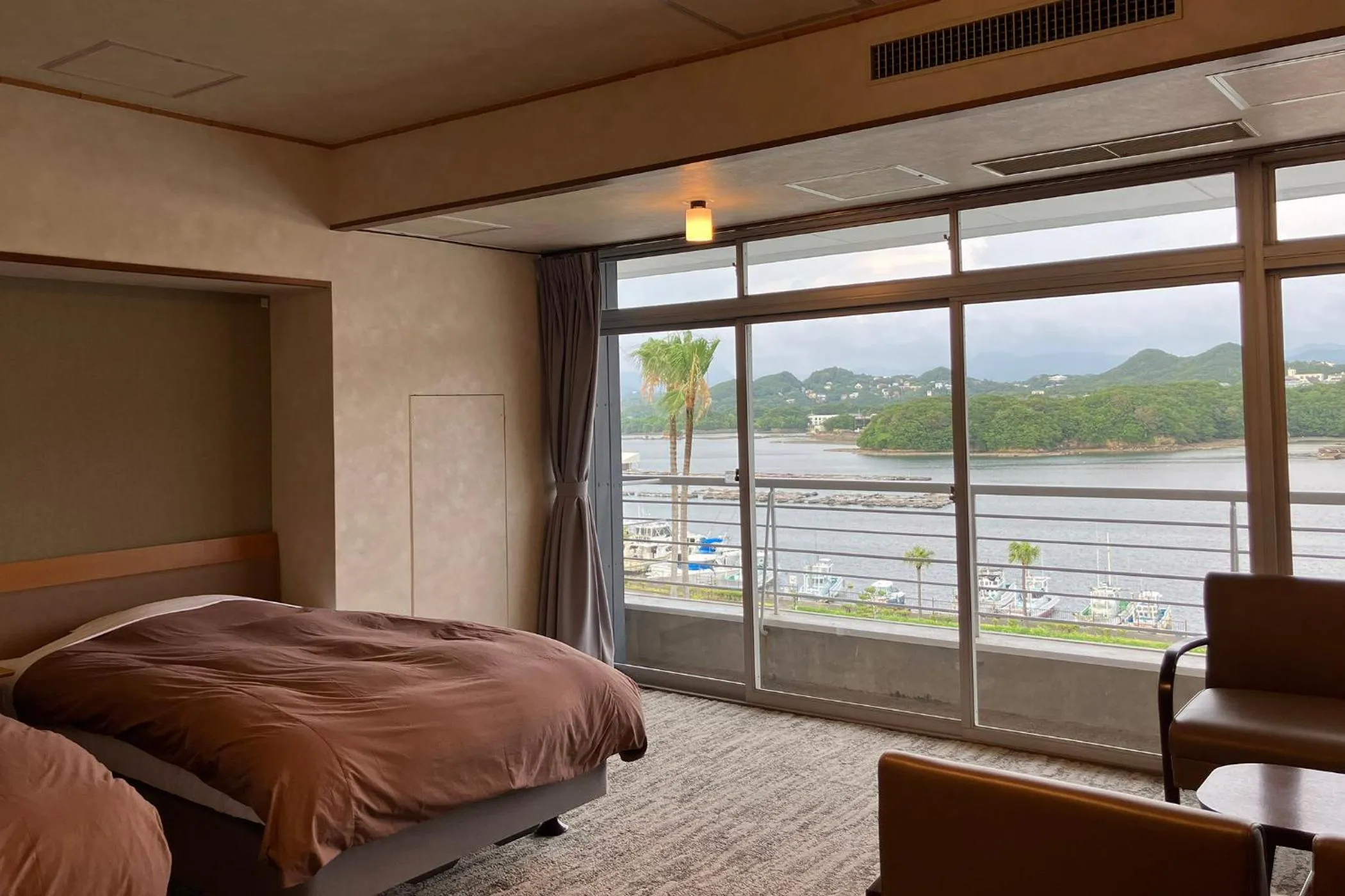 Photo of the whole room, Bed in Ooedo Onsen Monogatari Premium Shirahama Saichoraku