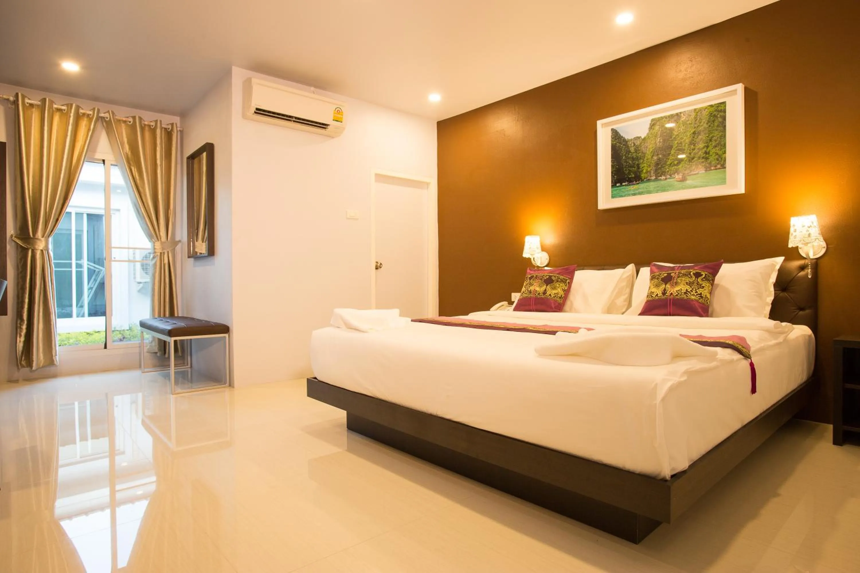 Photo of the whole room, Bed in Pongsakorn Boutique Resort