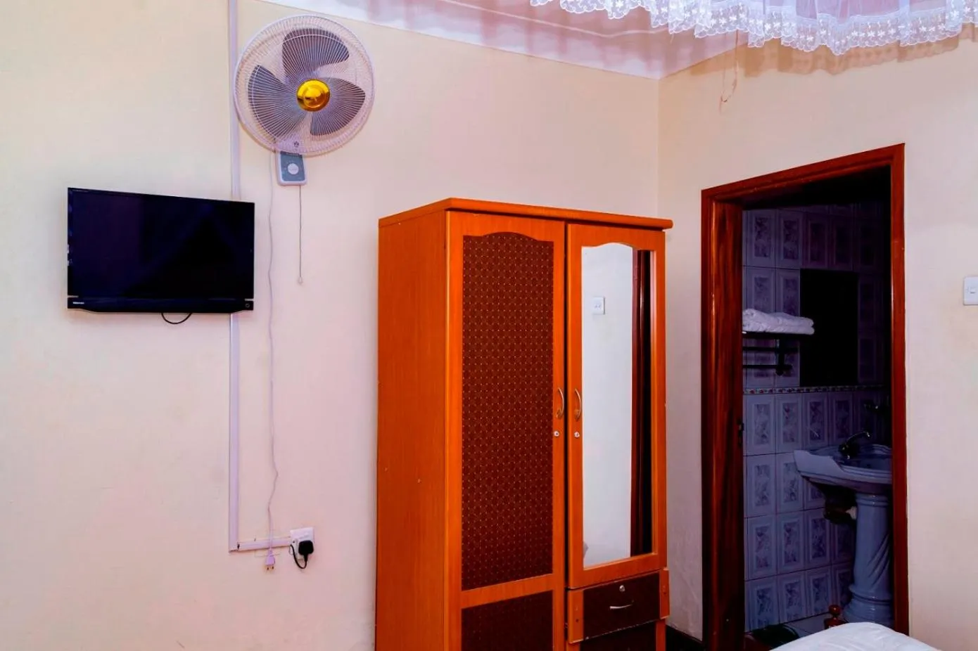 Communal lounge/ TV room in Kijungu Hill Hotel Hoima