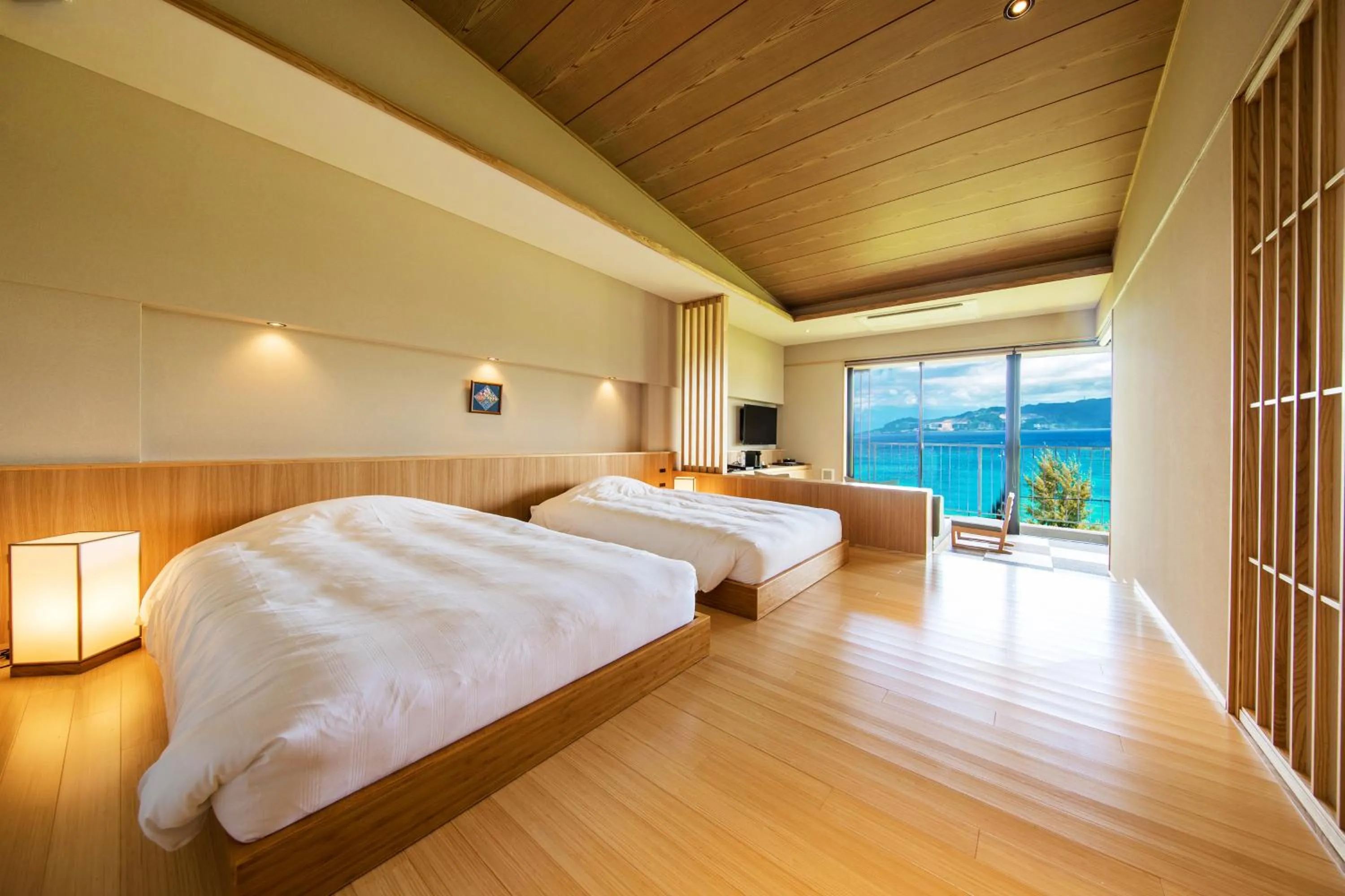 Photo of the whole room, Bed in Umino Ryotei Okinawa Nakamasou