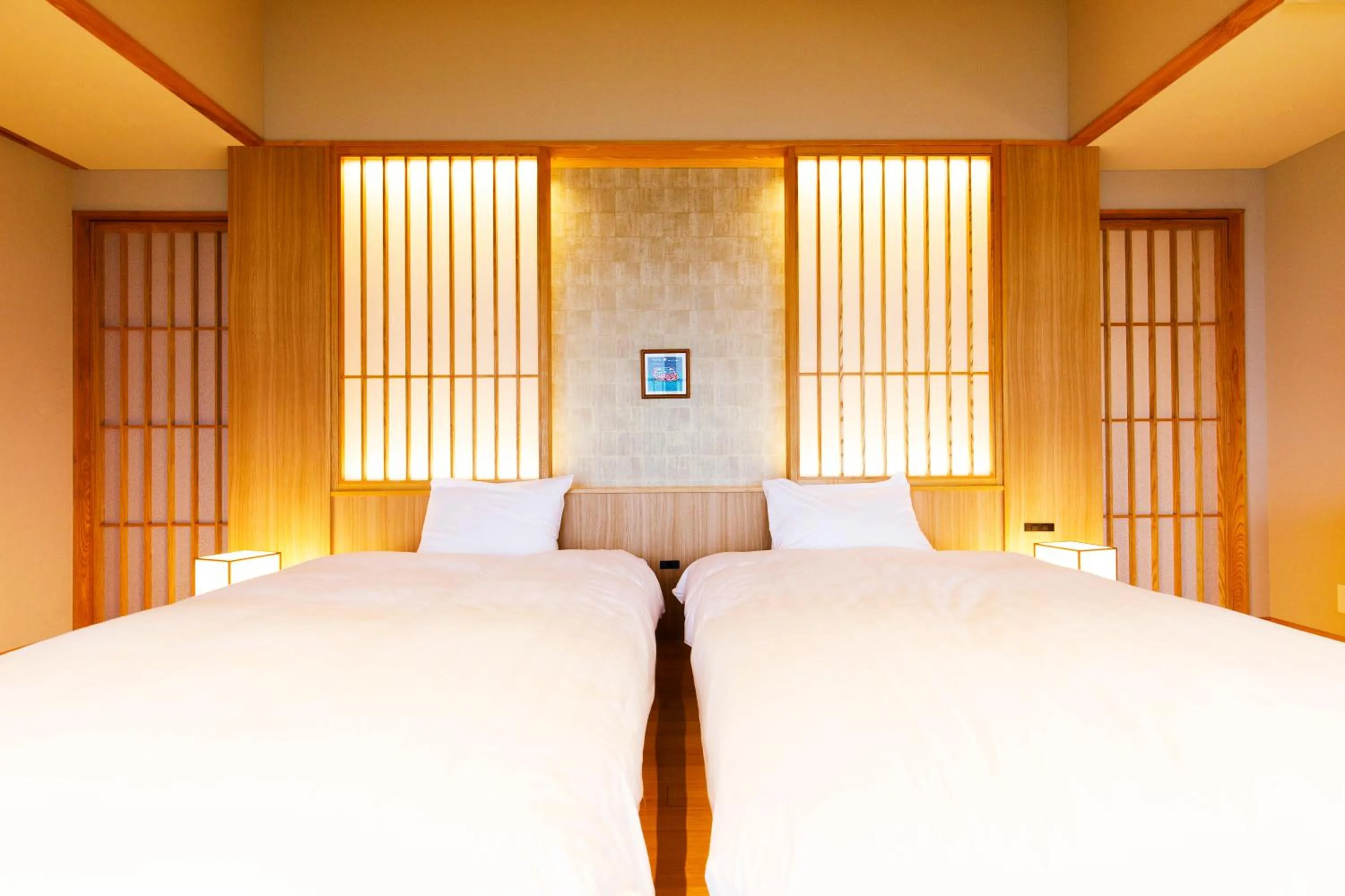 Bed in Umino Ryotei Okinawa Nakamasou