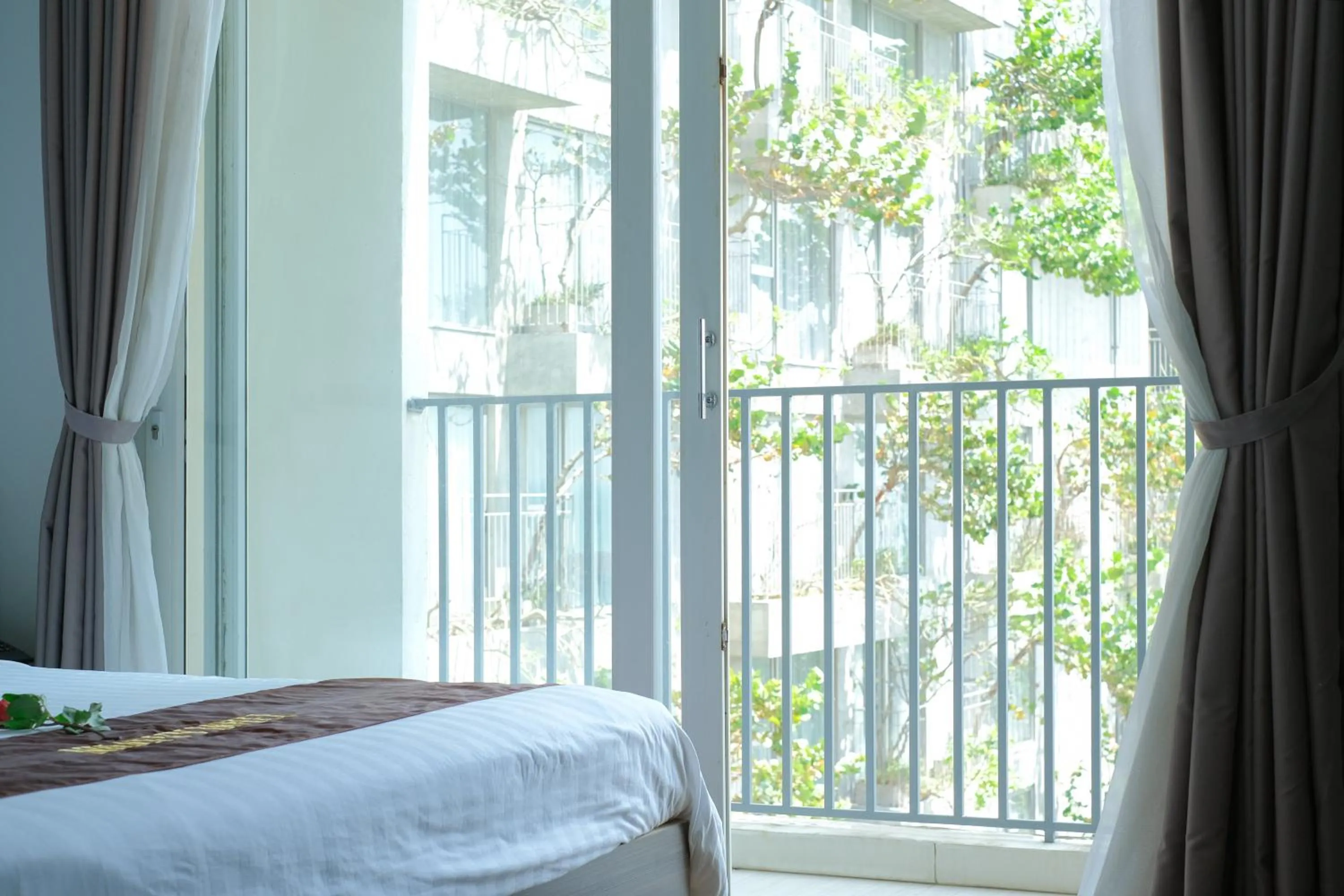 View (from property/room), Bed in Rich Hotel