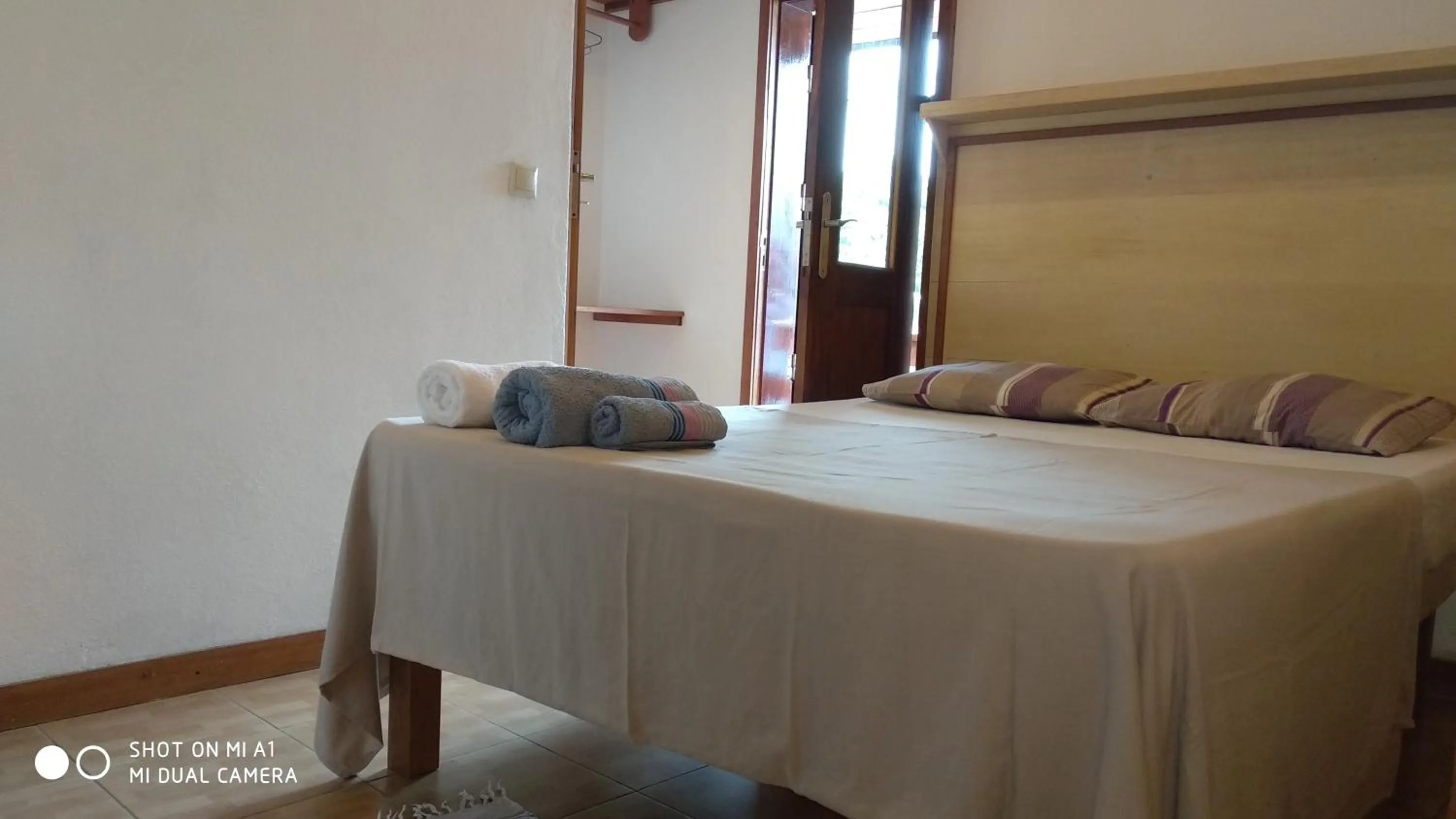 Bed in Albergaria Porcelana