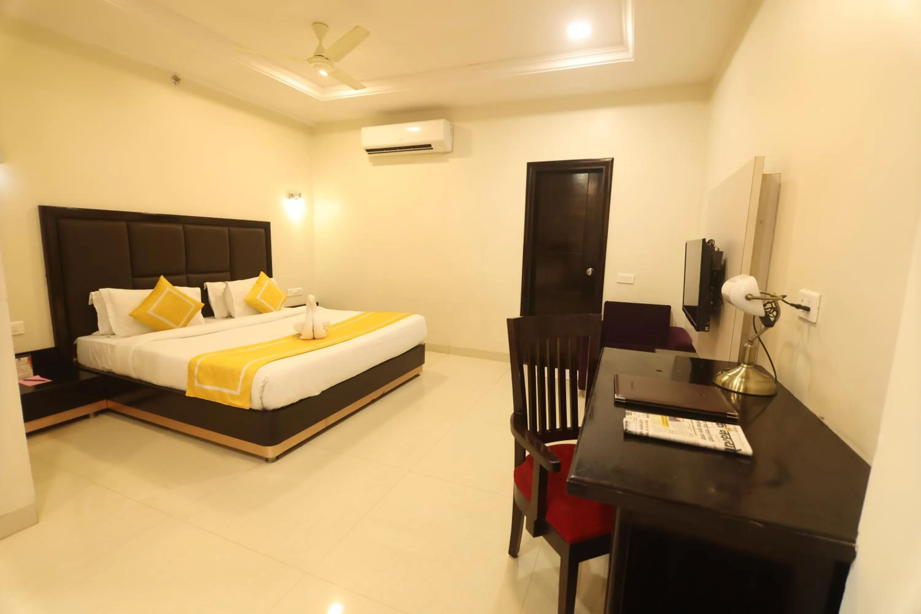 Photo of the whole room, Bed in Chandra Grand