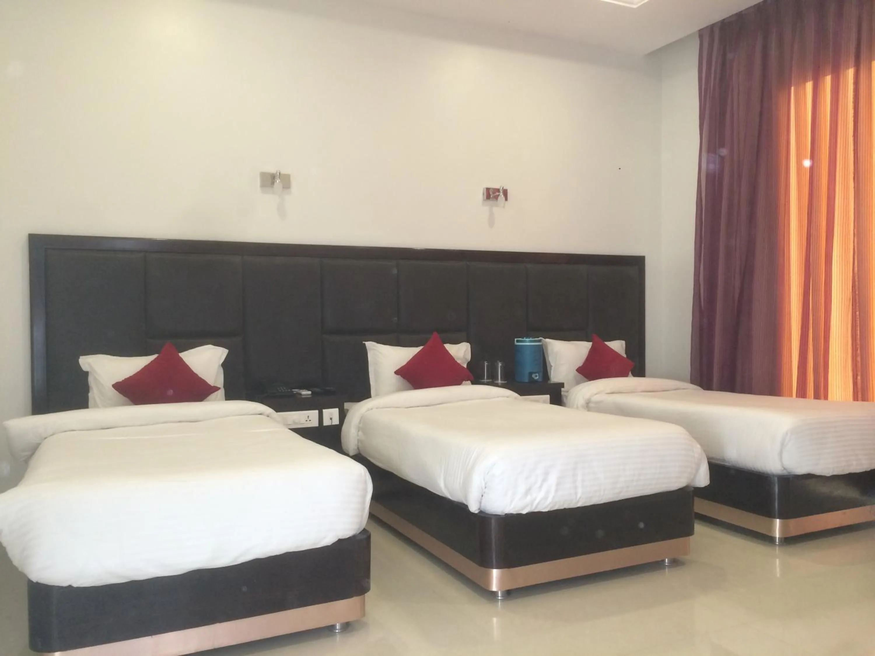 Photo of the whole room, Bed in Chandra Grand