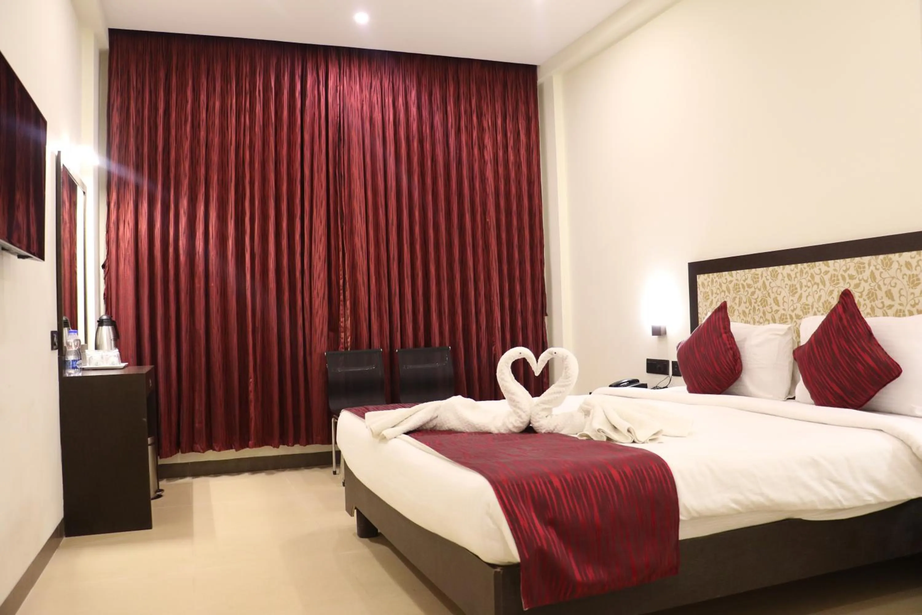 Bed in DsrMadhanamInn