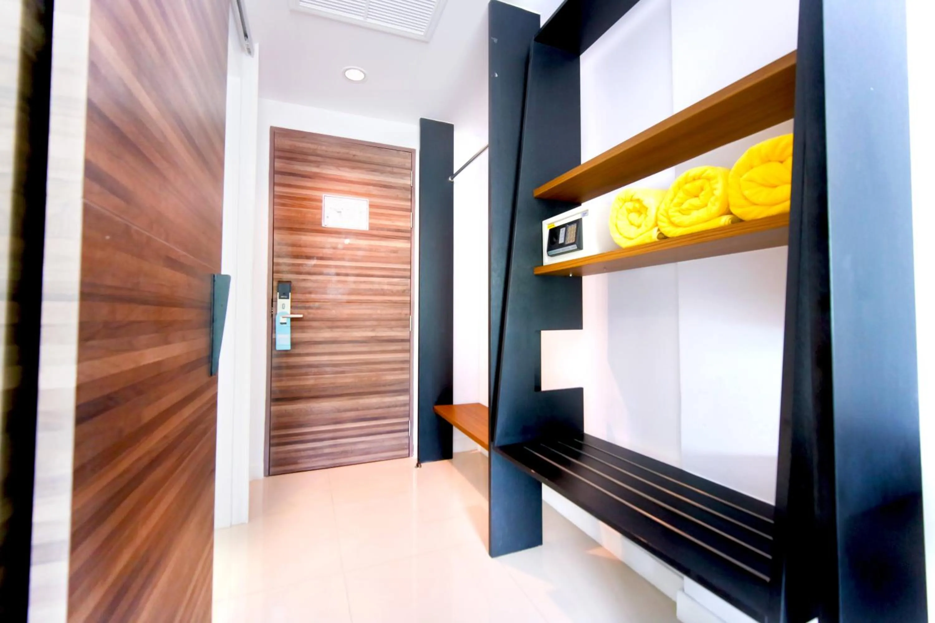 Communal lounge/ TV room, Bed in Phoenix Grand Patong