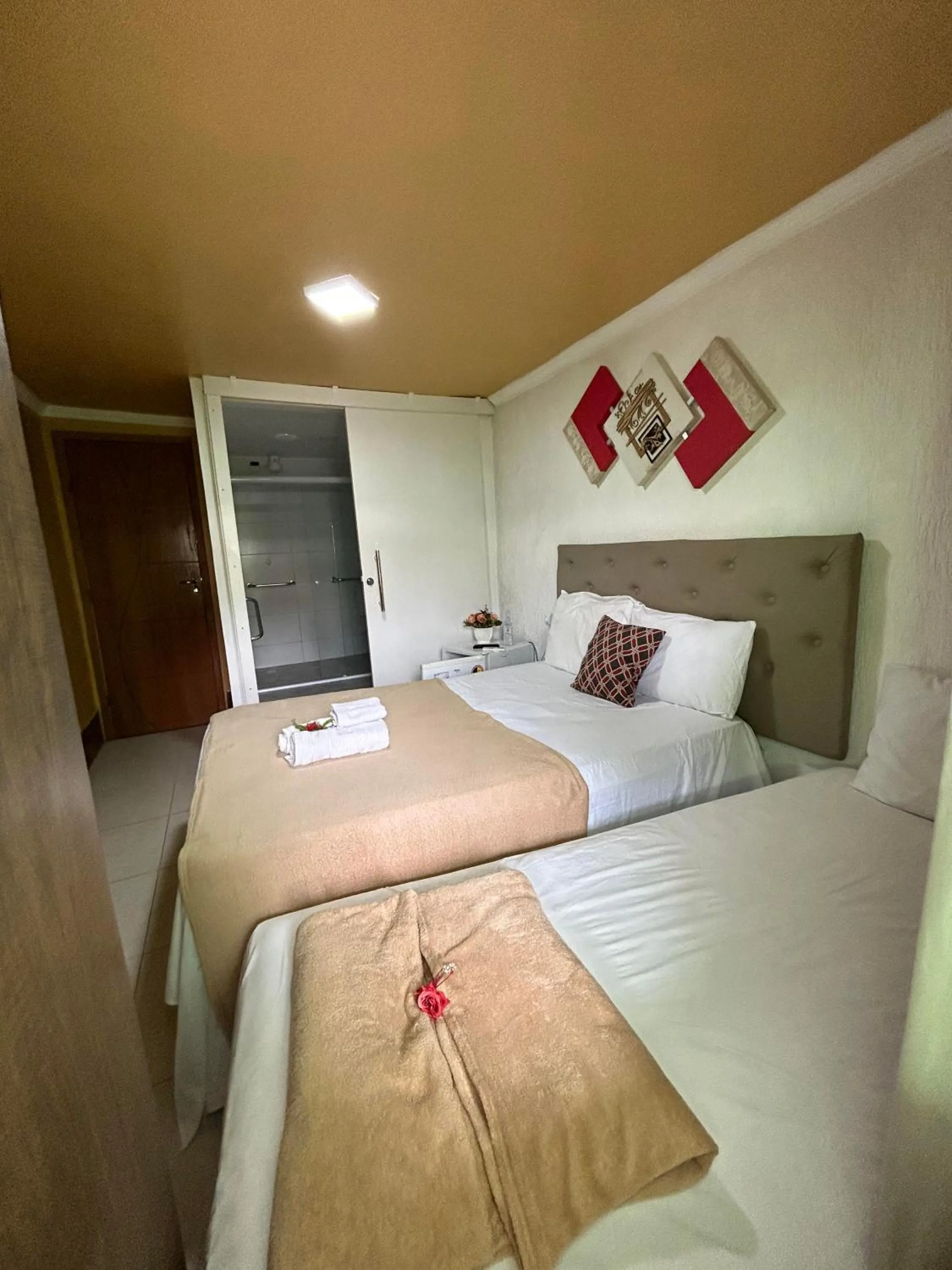 Bed in Pousada Caminho do Pontal