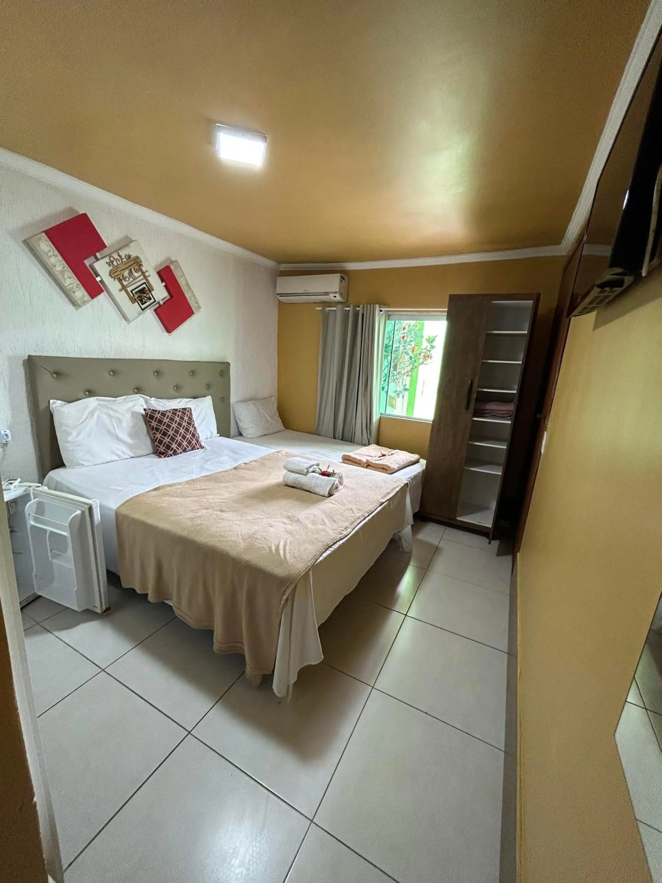 Bed in Pousada Caminho do Pontal