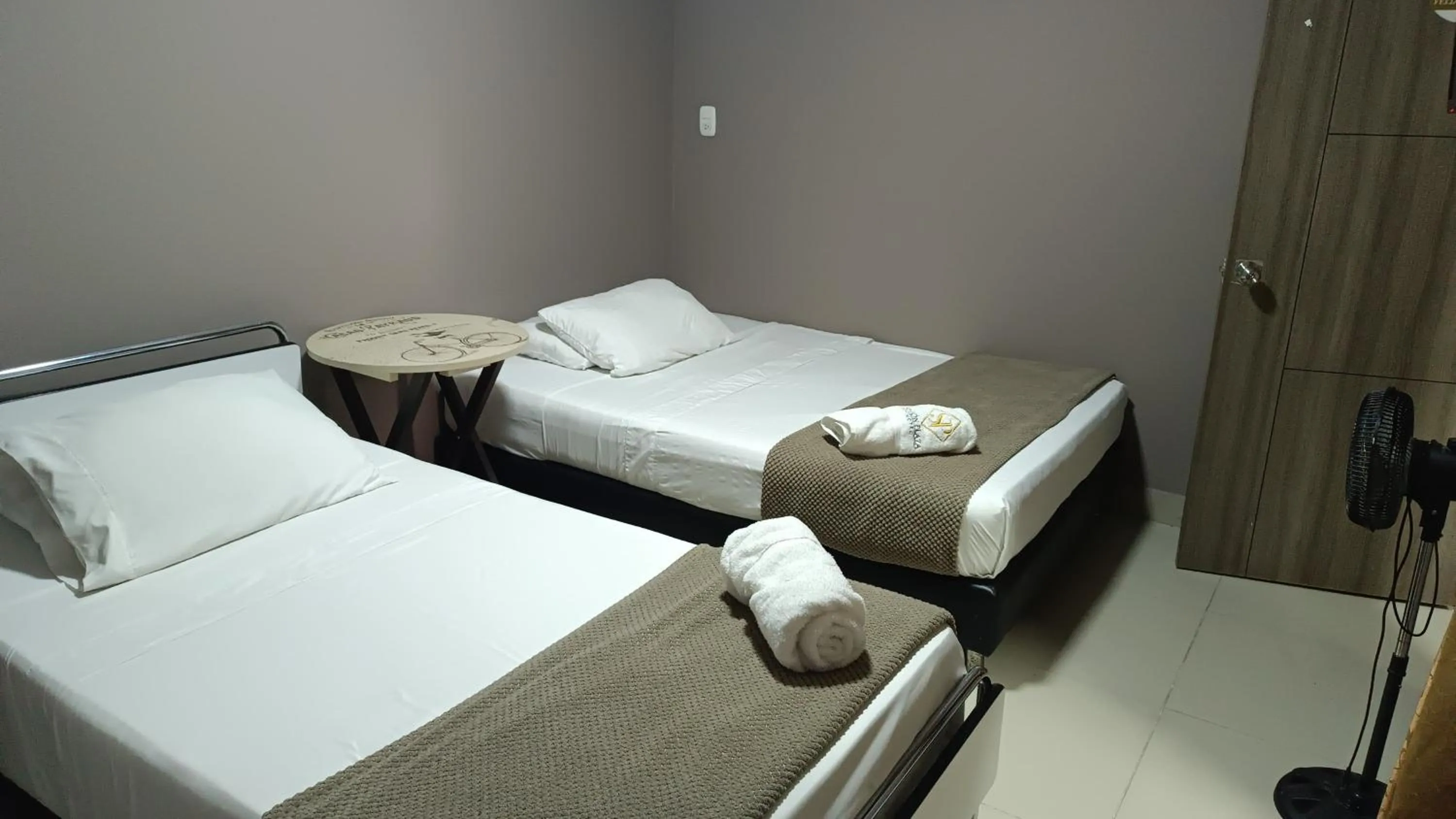 Bed in Hotel Simón Plaza