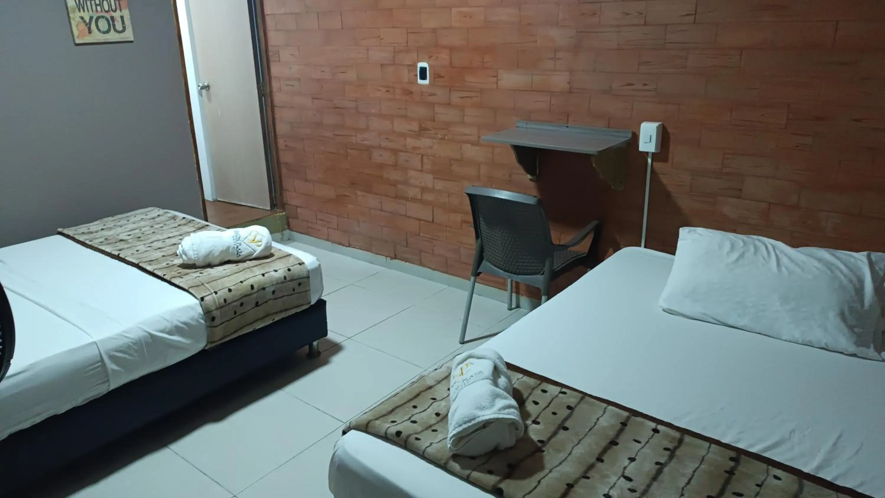 Bed in Hotel Simón Plaza