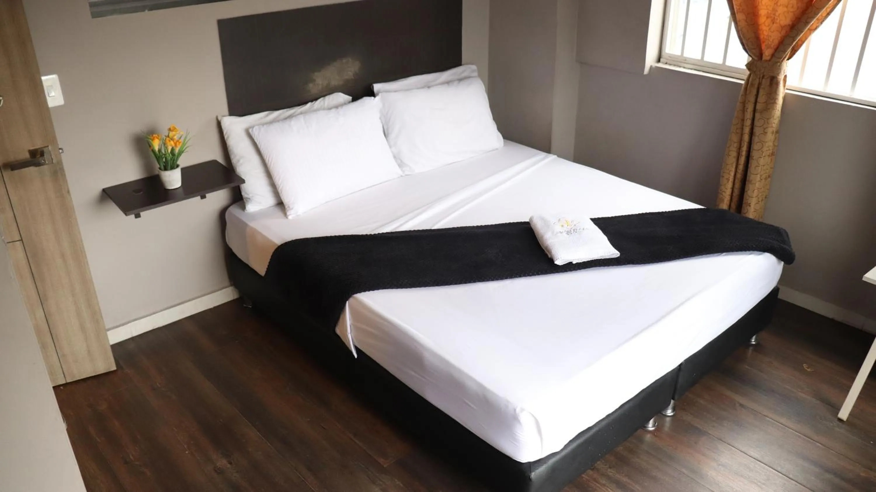 Bed in Hotel Simón Plaza