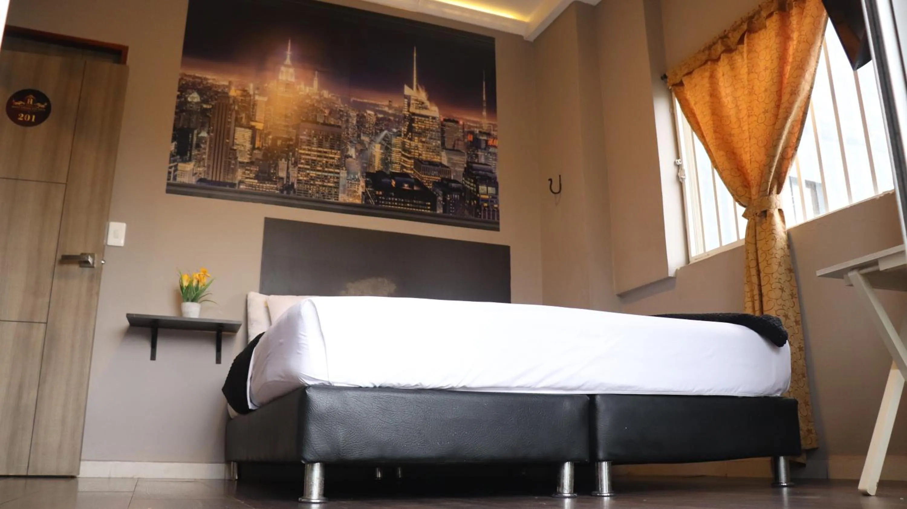 Bed in Hotel Simón Plaza