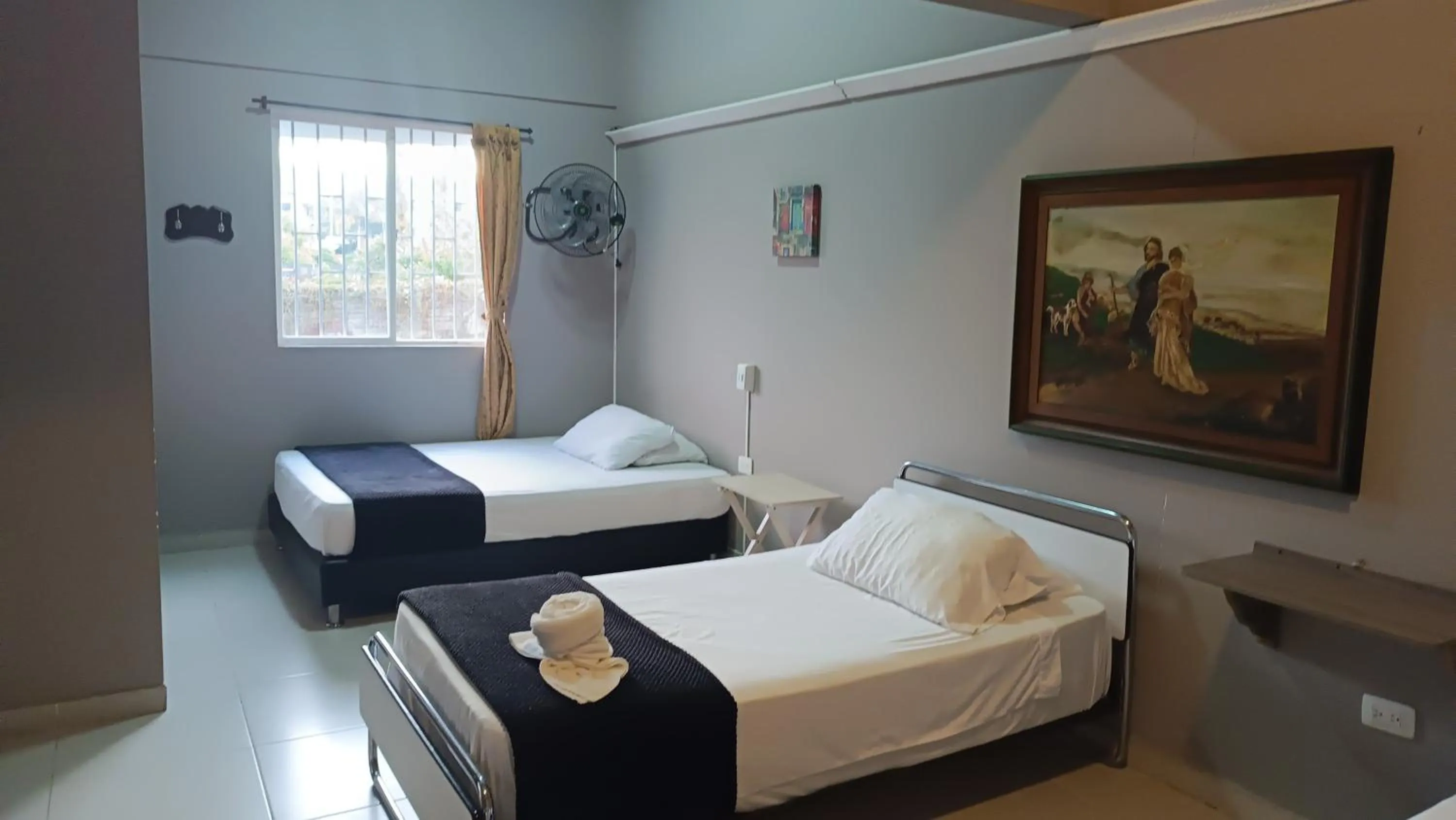 Bed in Hotel Simón Plaza