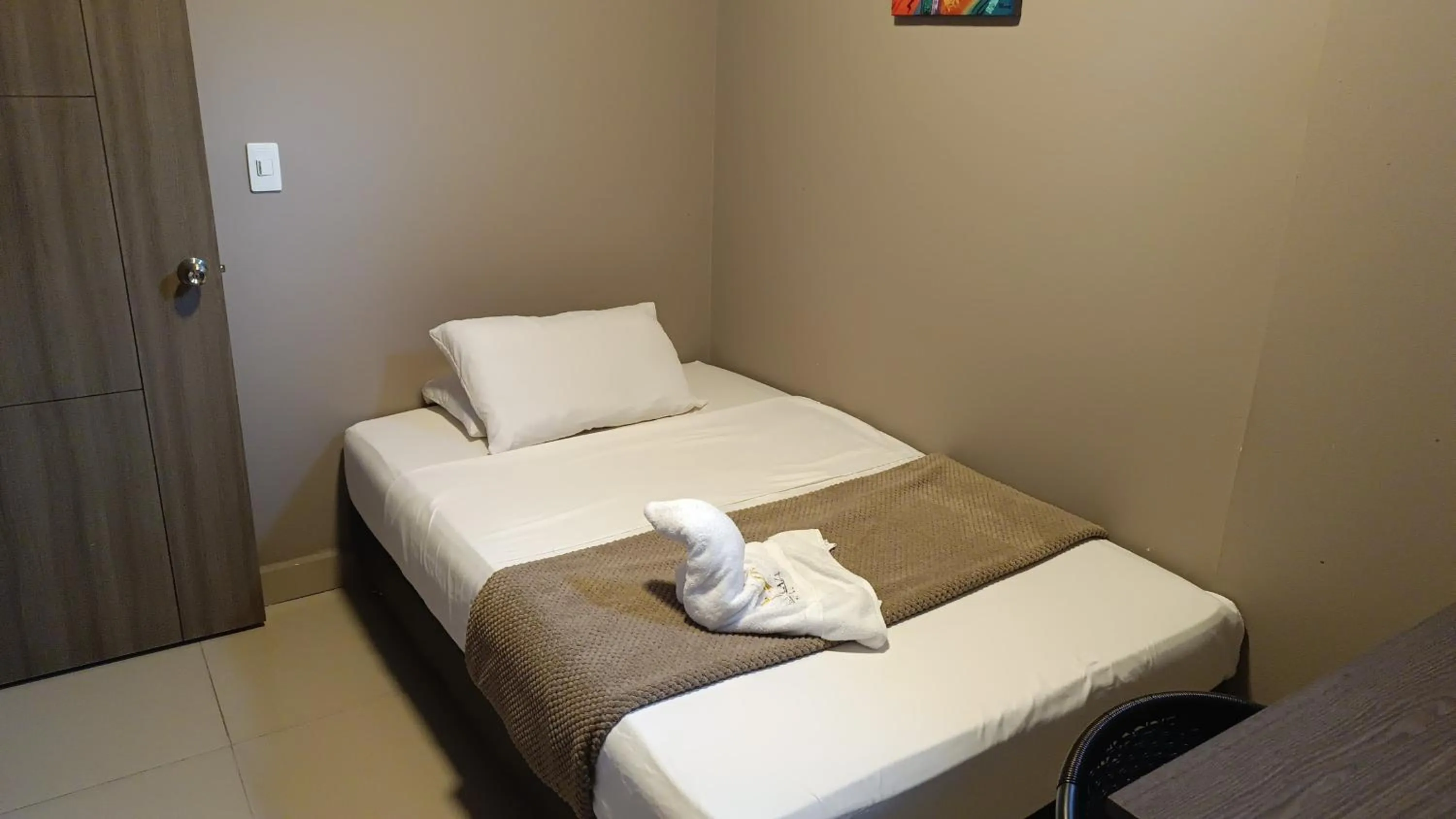 Bed in Hotel Simón Plaza