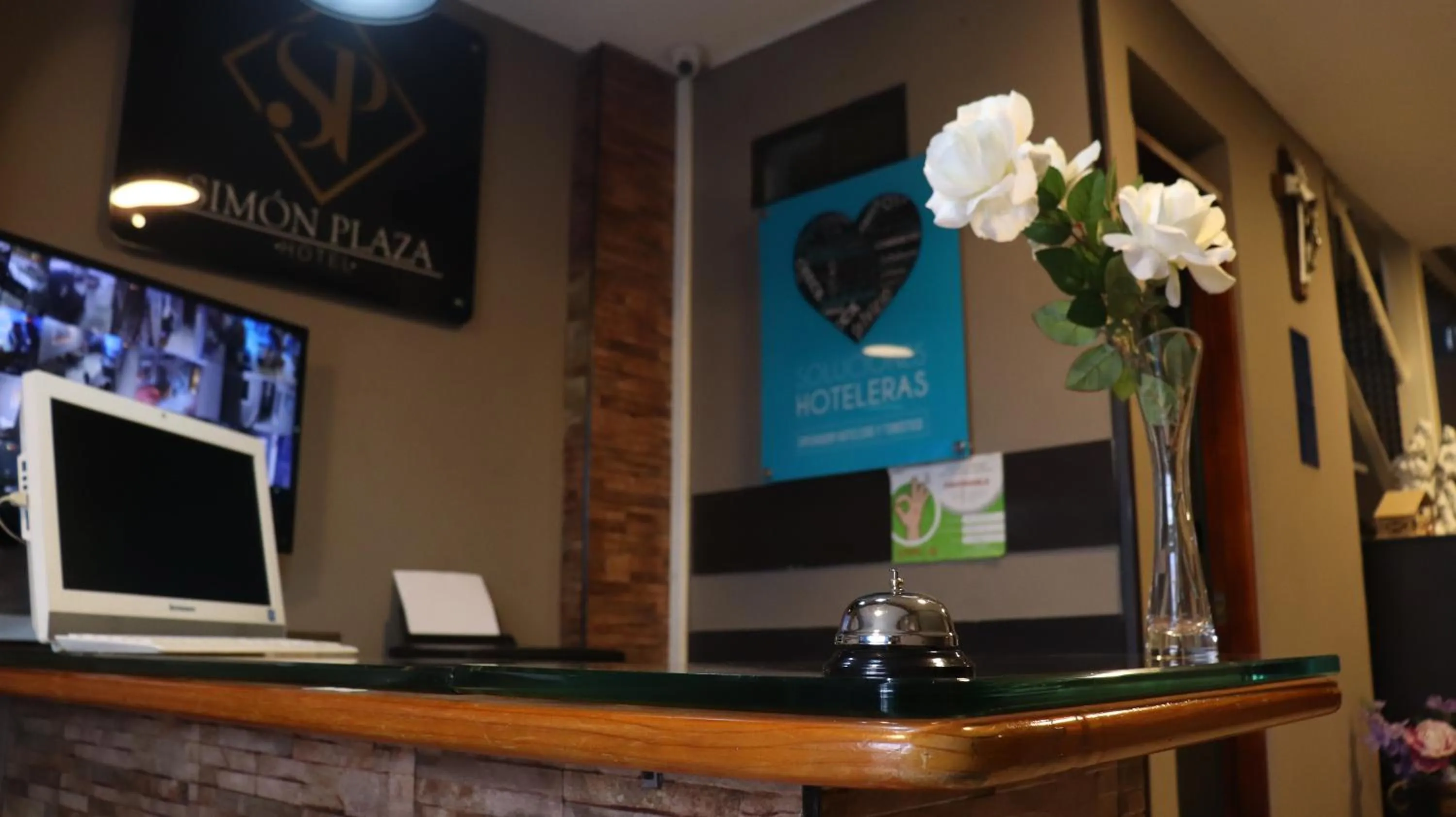 Lobby or reception in Hotel Simón Plaza
