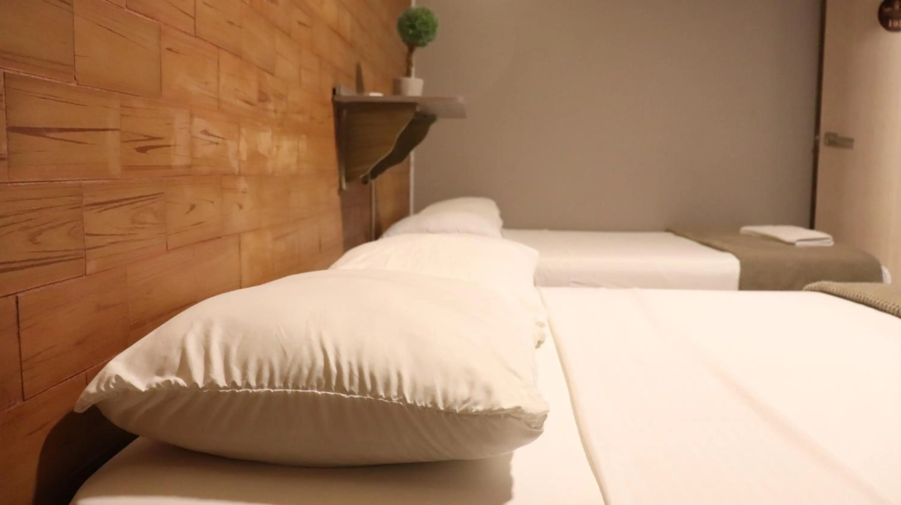 Bed in Hotel Simón Plaza