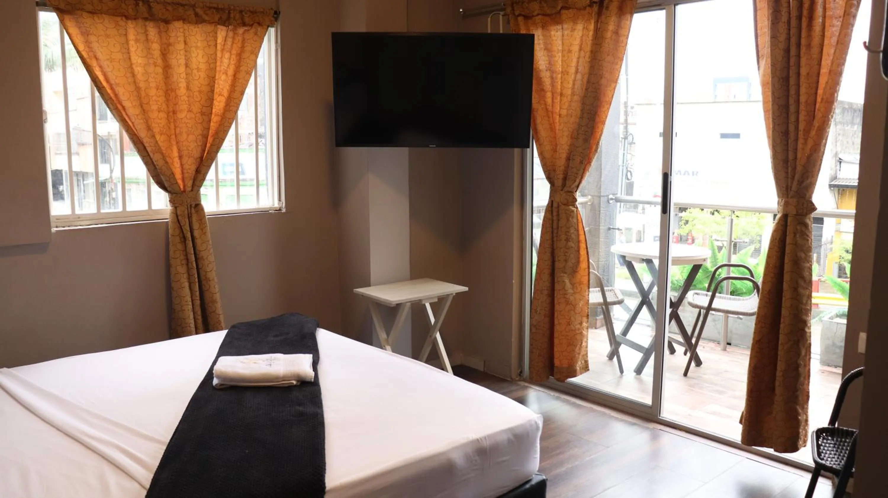 Bed in Hotel Simón Plaza