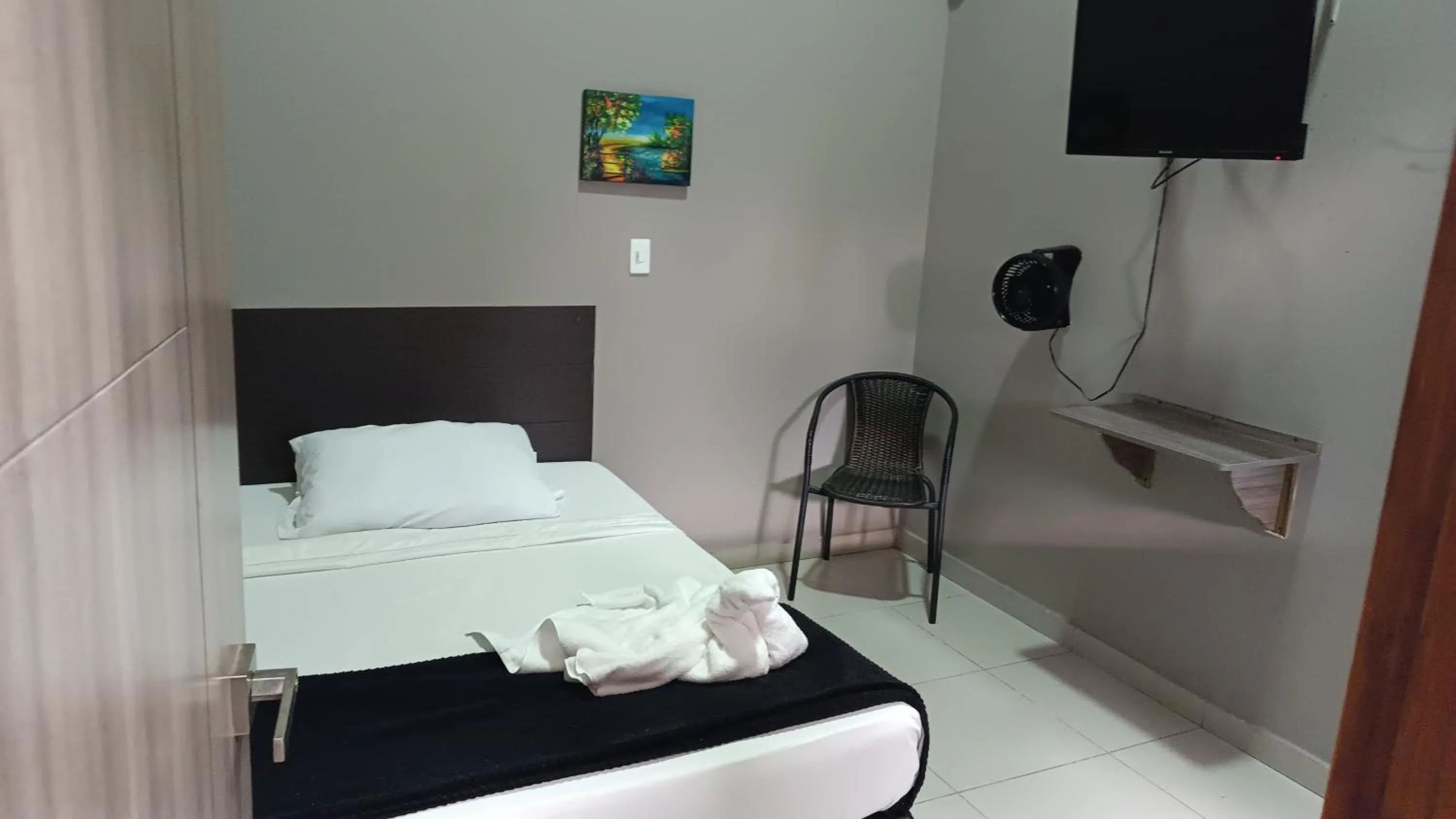 Bed in Hotel Simón Plaza