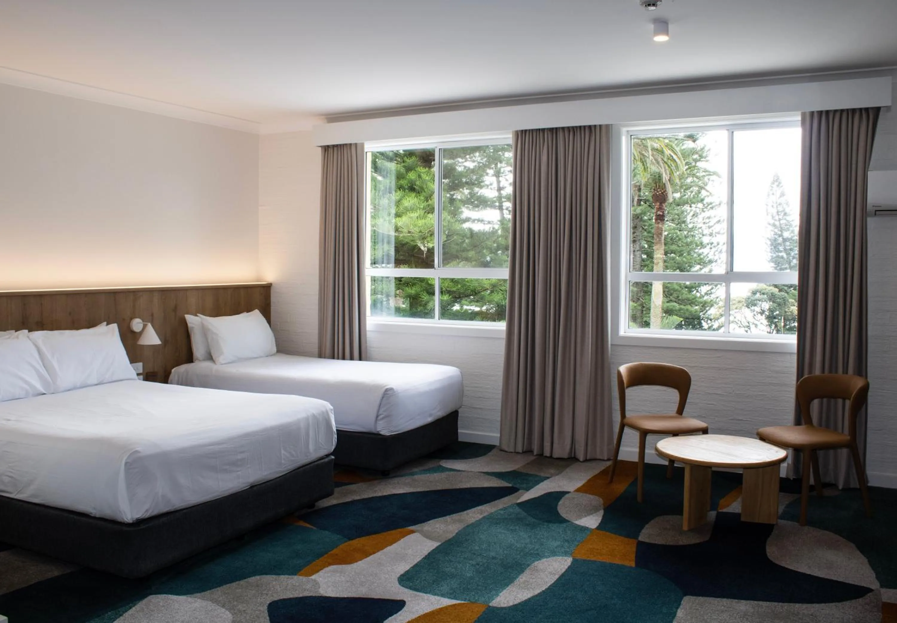 Bed in Seabreeze Beach Hotel