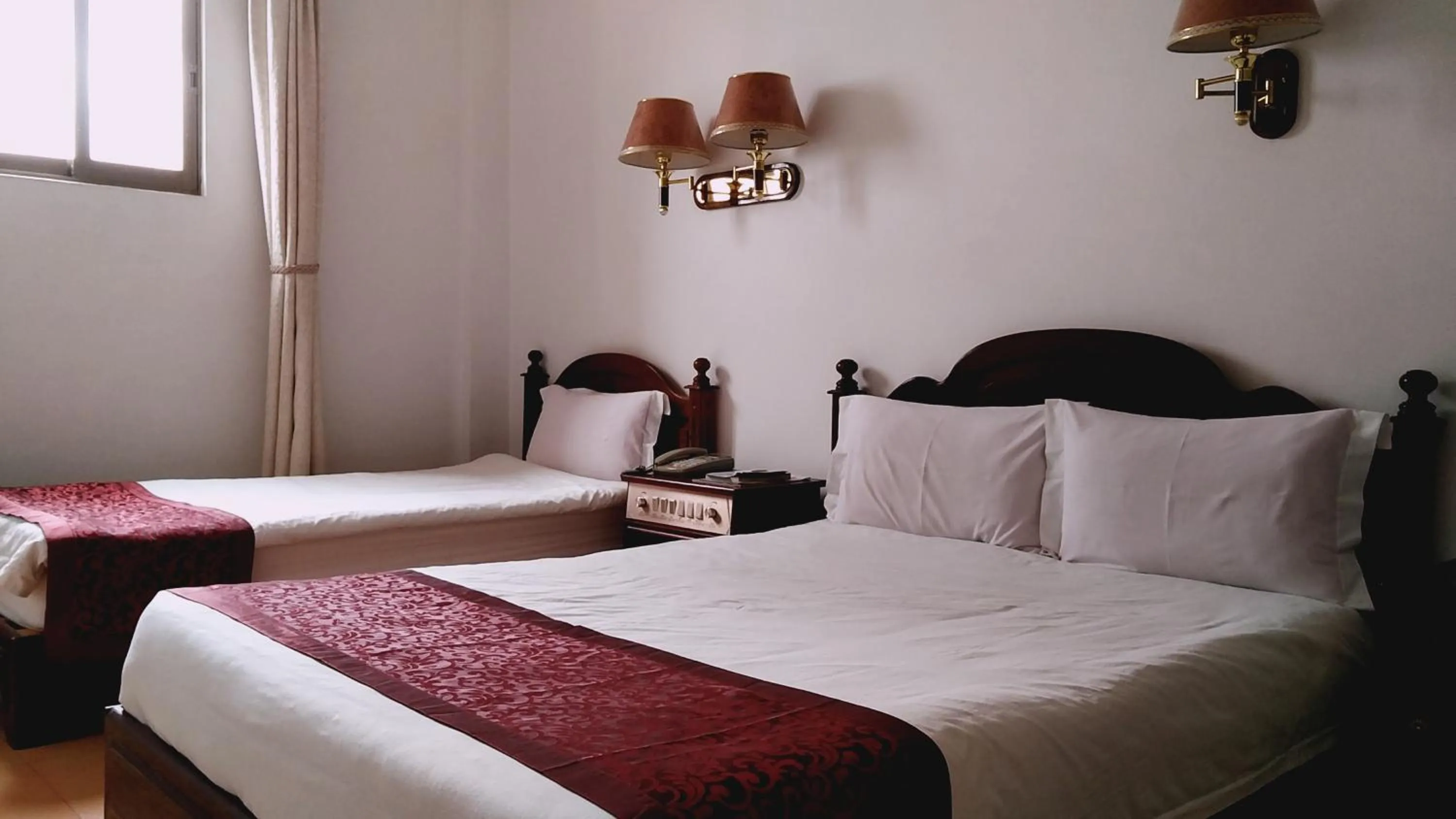 Bed in Evergreen Hotel