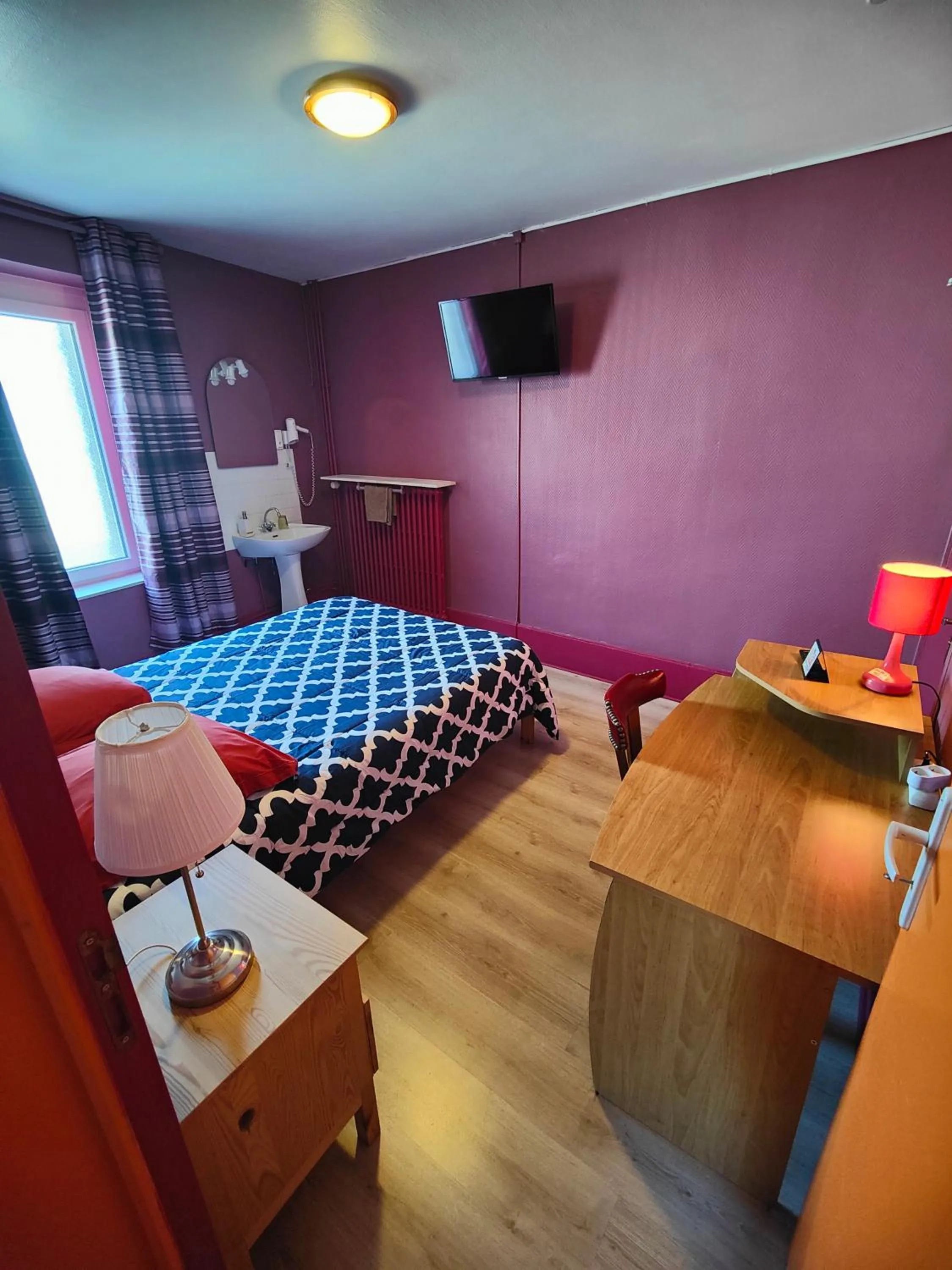 Bed in L'Hôtel du Mouton blanc