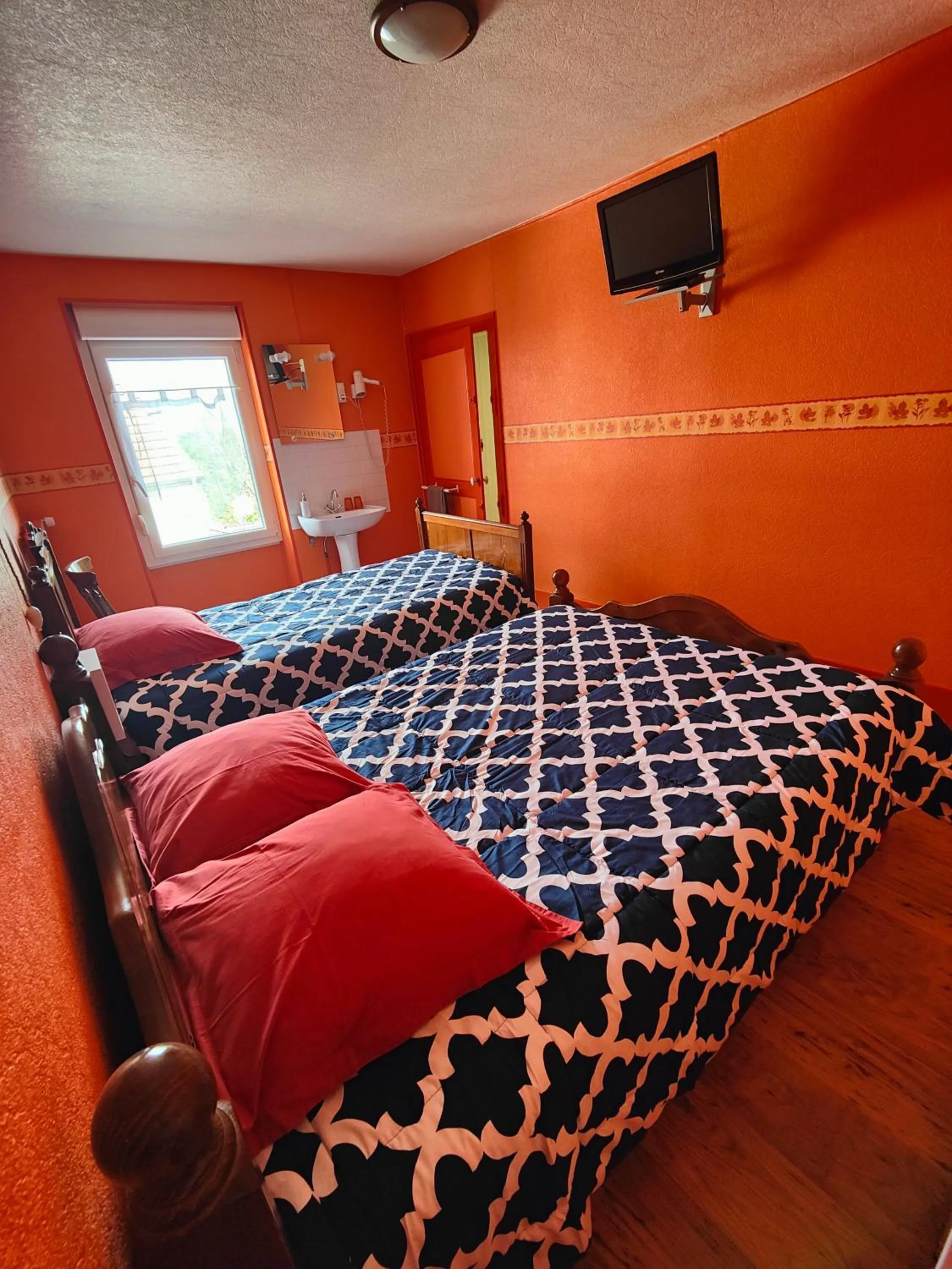 Bed in L'Hôtel du Mouton blanc