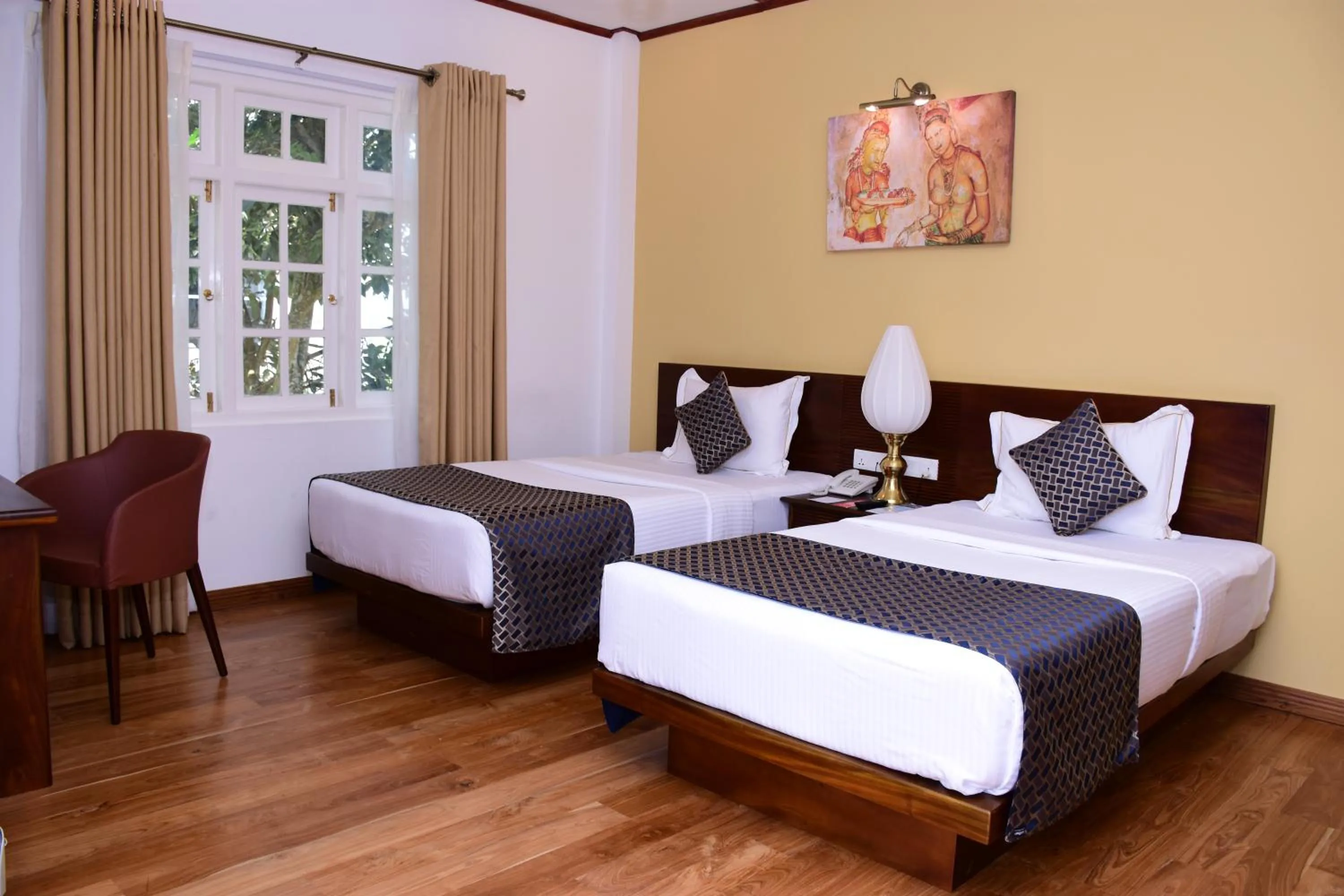 Bed in Mirage Kings Cottage