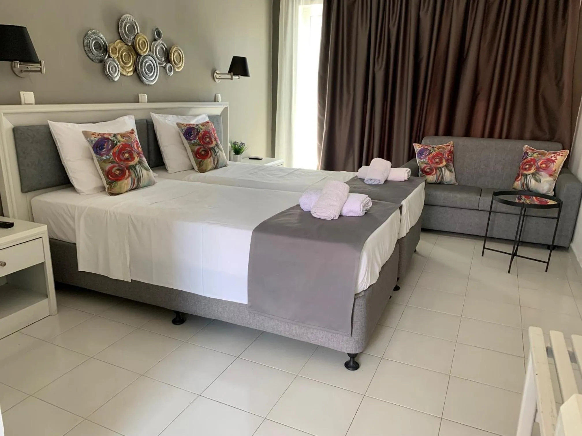 Bed in Alkyonides Boutique Hotel